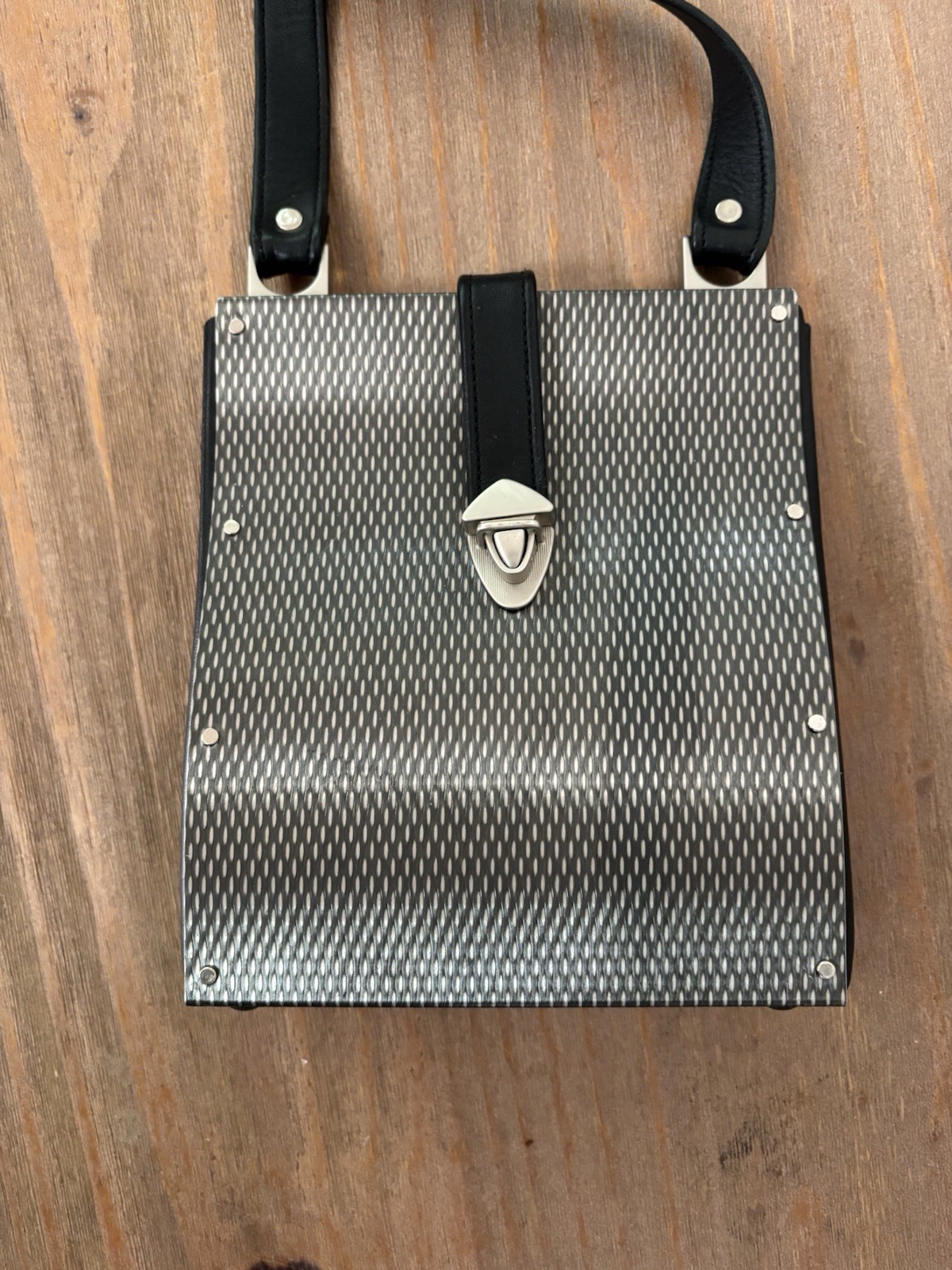 Wendy Stevens industrial stainless steel and leather drop bag mini $595