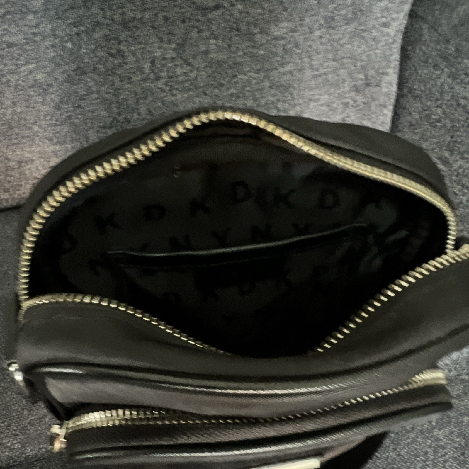 DKNY Small Black Crossbody Bag Zip Silver Hardware Logo Lined Inner Pockets