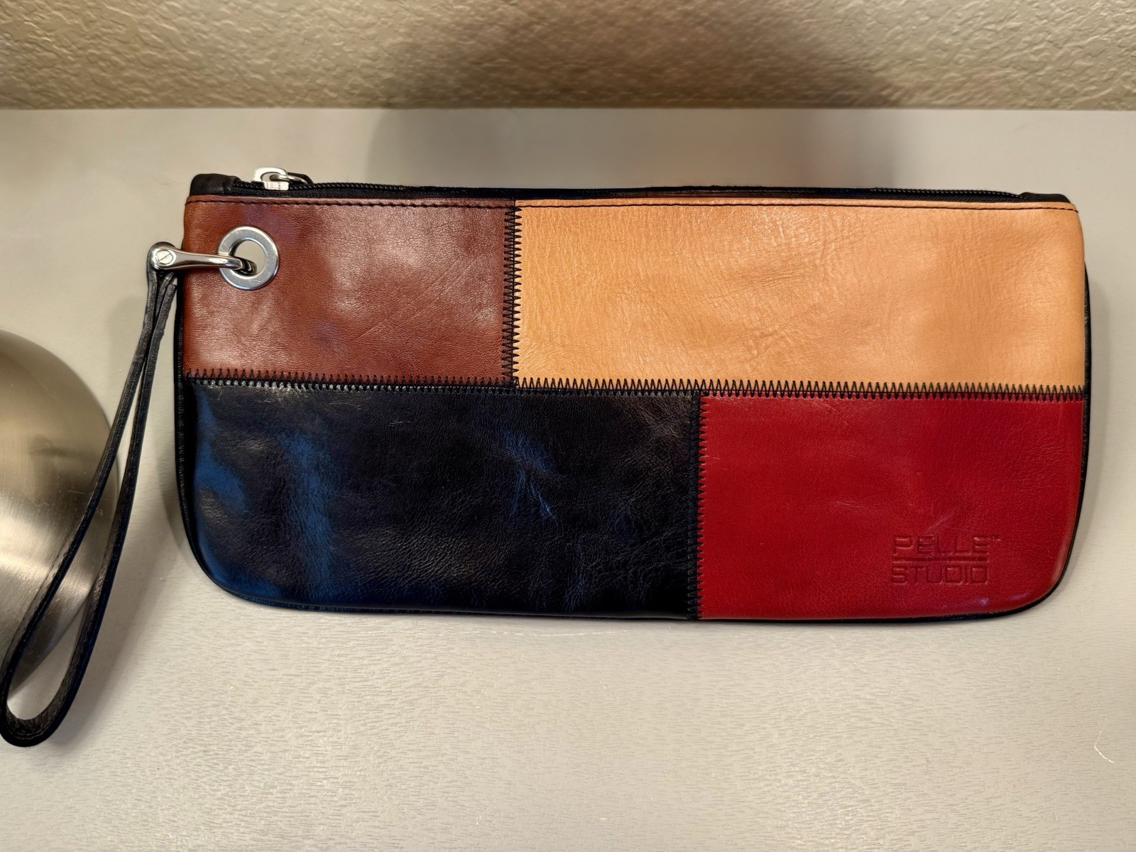 Wilson’s Leather Pelle Studios Multi Color Vintage Clutch