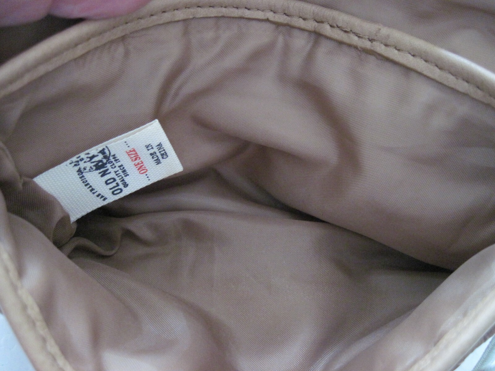 Old Navy camel colored wristlet, 100% cowhide leather front, cotton back
