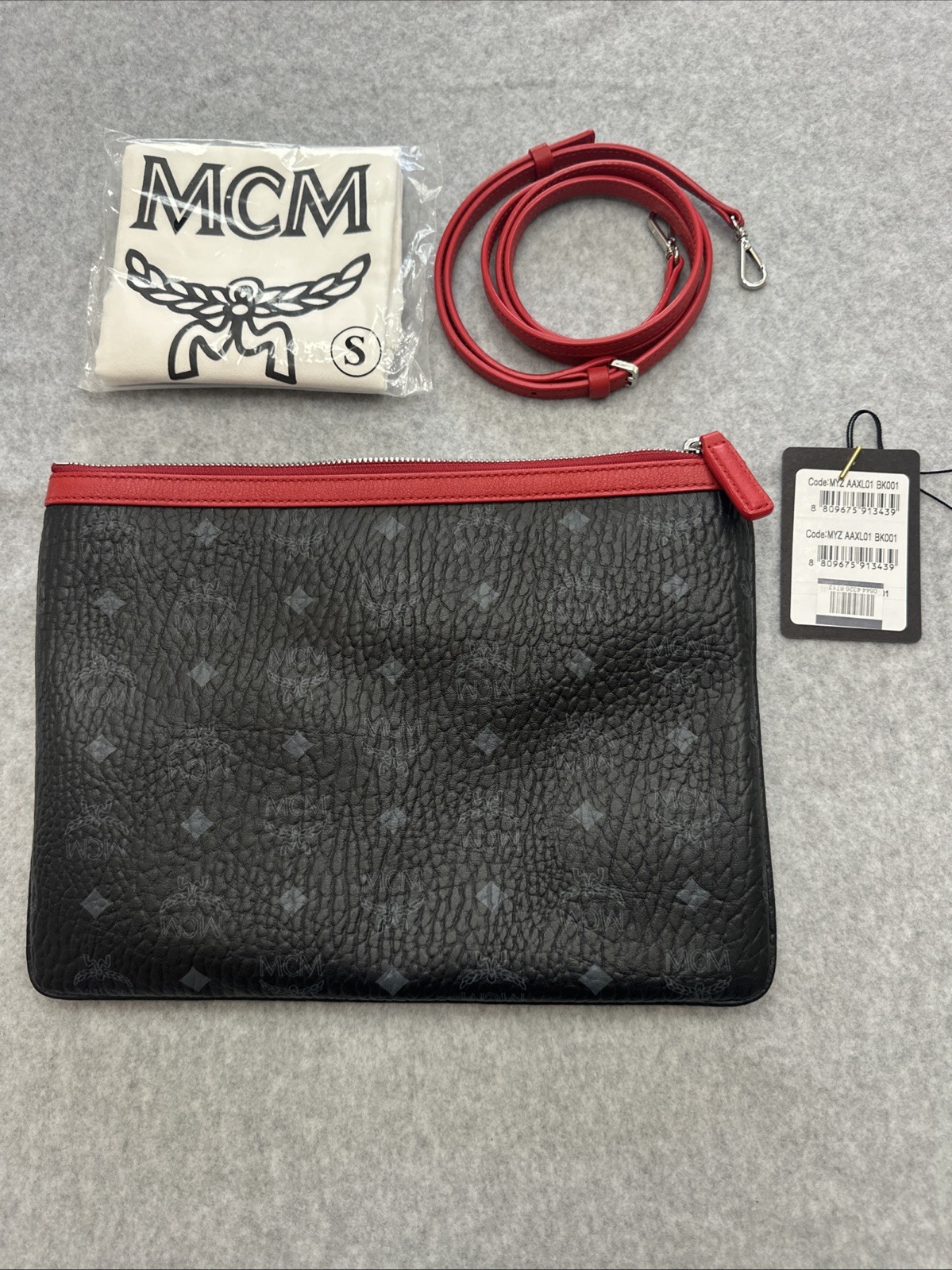 Authentic MCM Crossbody Pouch in Visetos Original / BLACK & RED