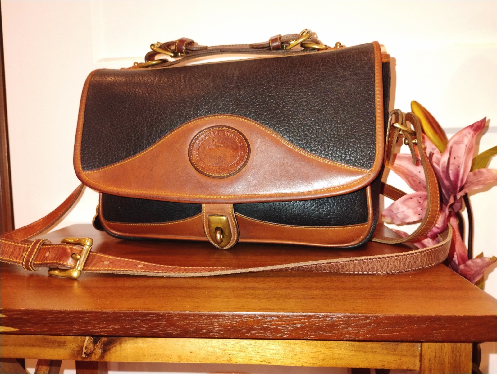 Vintage Dooney & Bourke All-Weather Leather Crossbody Bag Black with Brown Trim