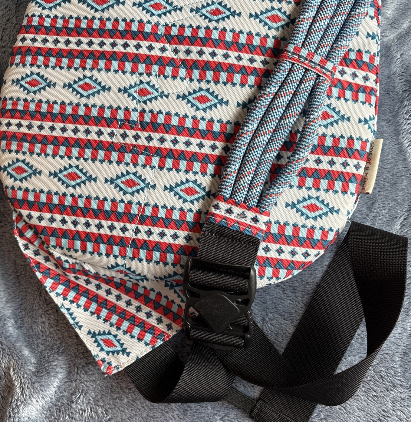 Kavu rope sling bag crossbody Pack Very Clean cond aztec print blue red and gray