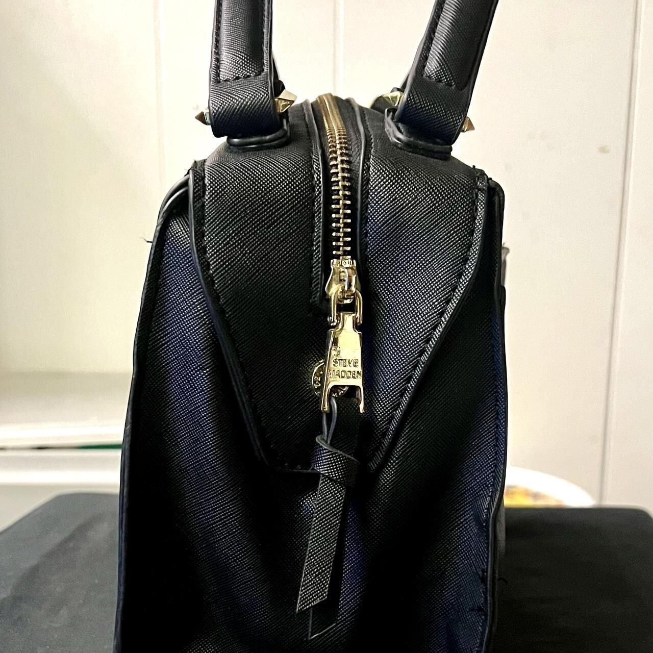 Steve Madden small black purse. 100% Polyester