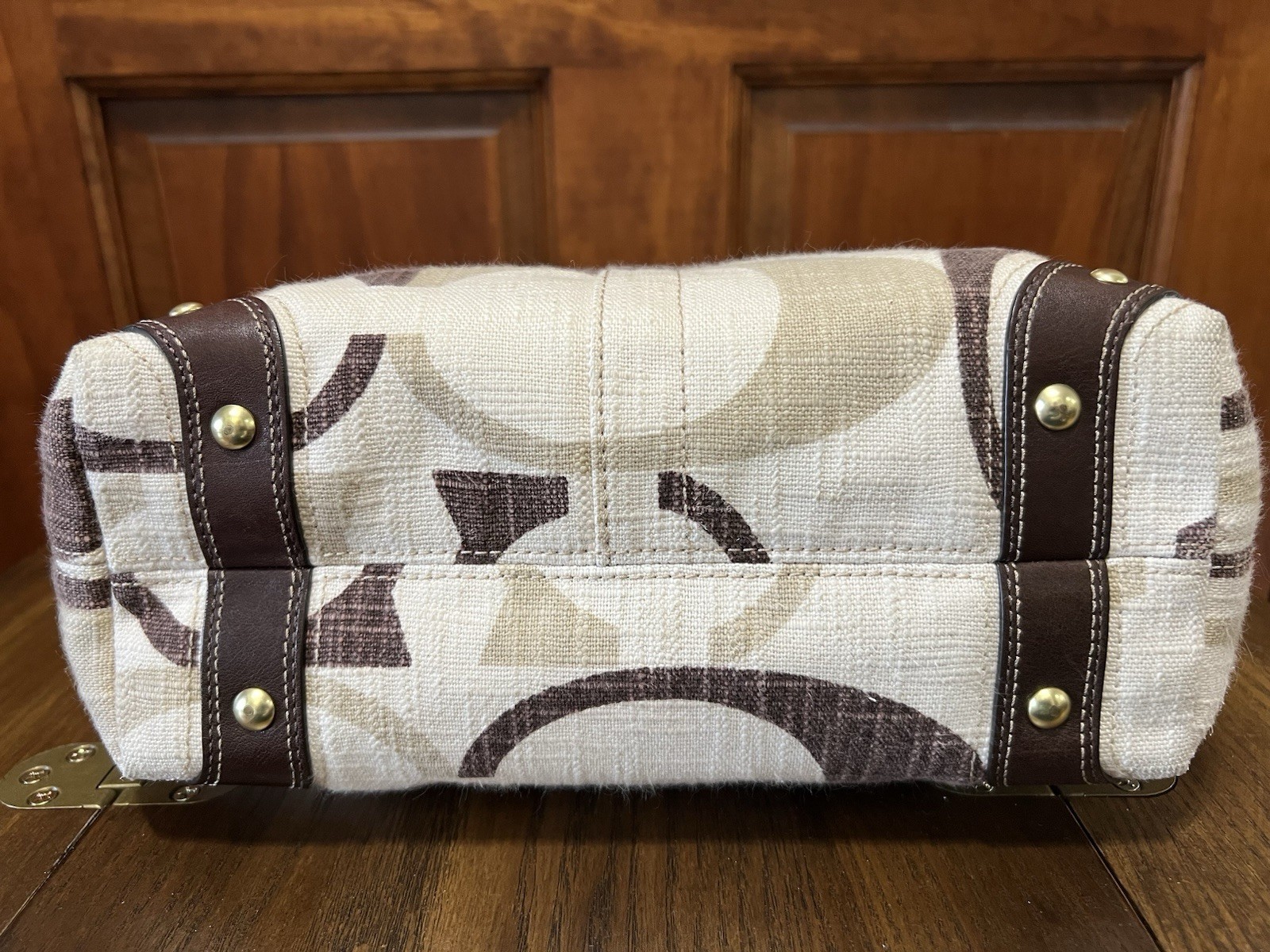 Coach Signature Medium sized Carly with matching wallet.