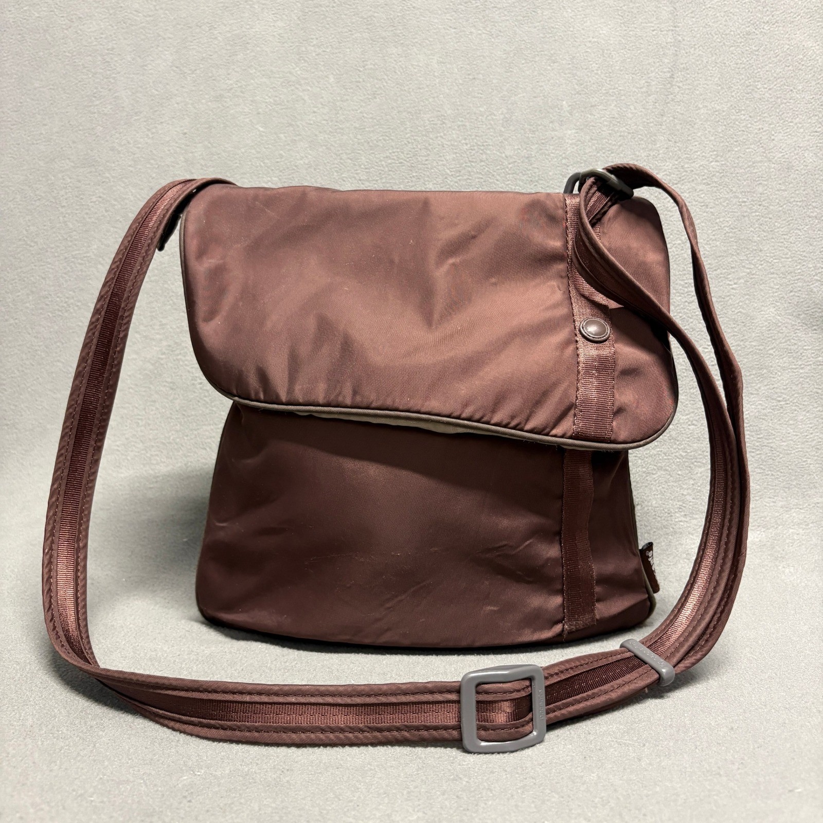 PACSAFE SlingSafe 100 Exomesh Anti-Theft Safety Crossbody Bag in Brown