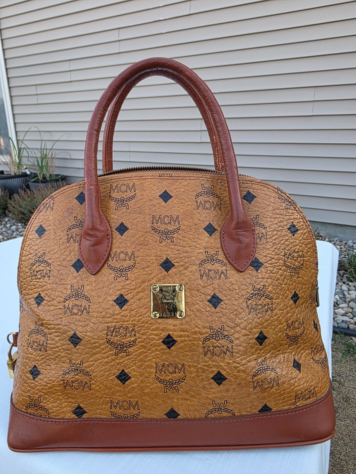 Vintage MCM Visetos Cognac Momogram dome Sachel “Alma”