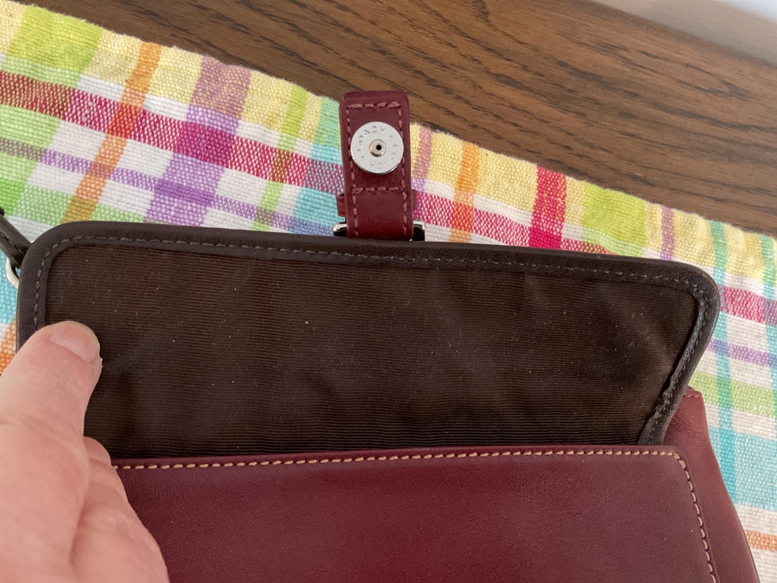 COACH. Burgundy Leather SOHO Clutch Wristlet Buckle Snap Silver Hardware NWOT