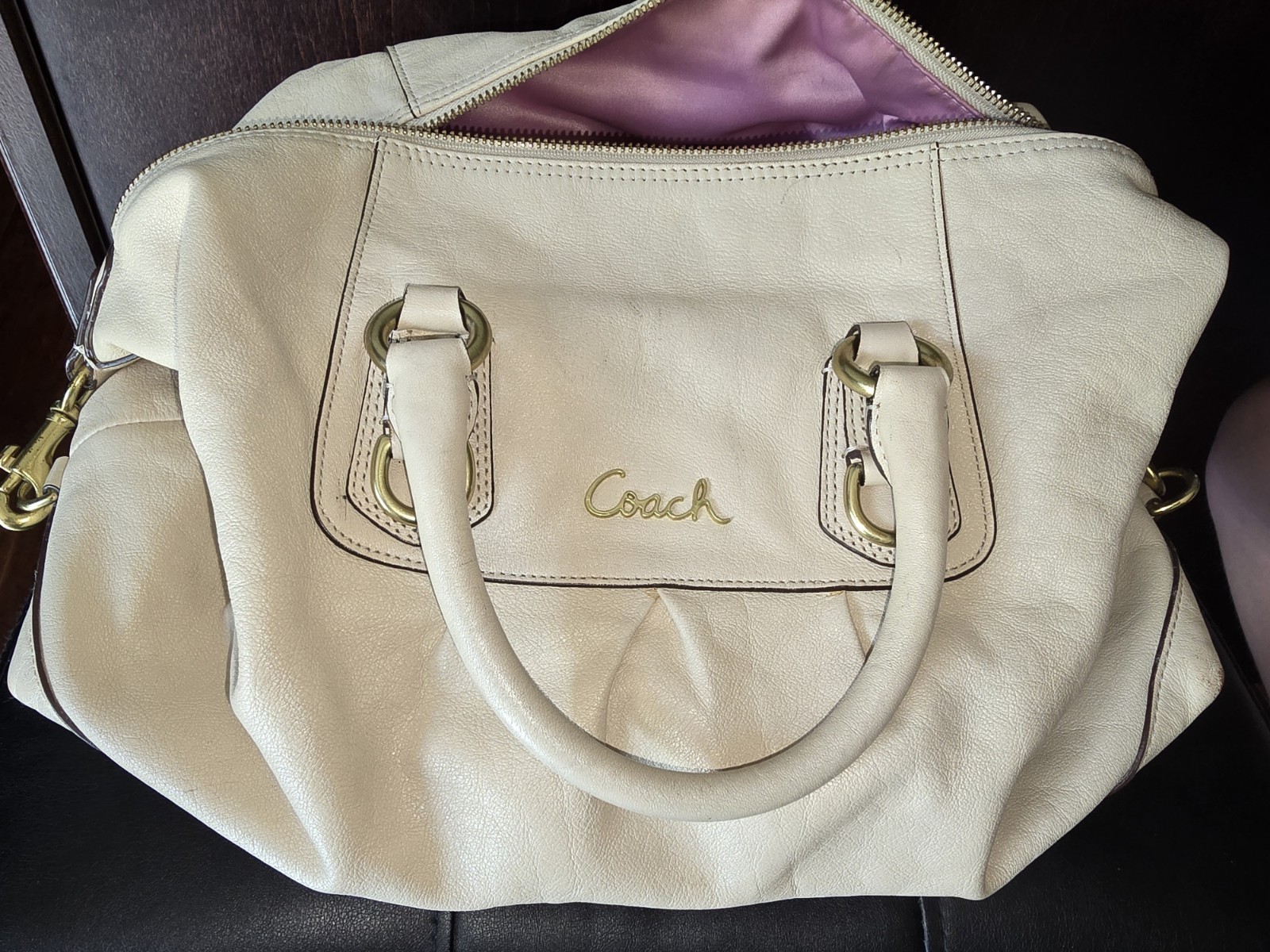 Coach Ashley Leather satchel featuring distinctive gold-tone hardware
