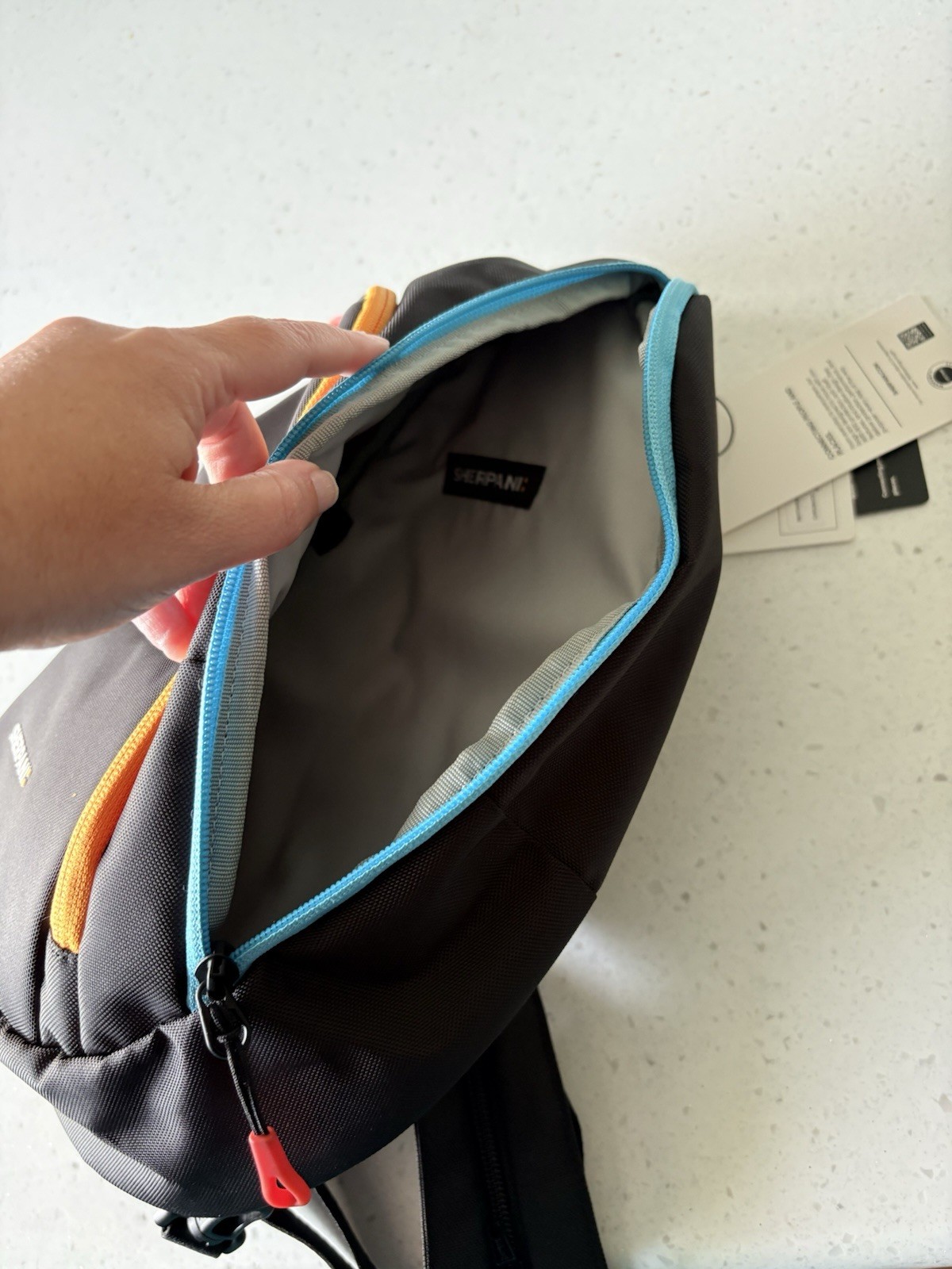 Sherpani Sling Bag RFID Blocking, Black w/ Blue & Orange Zippers, Travel