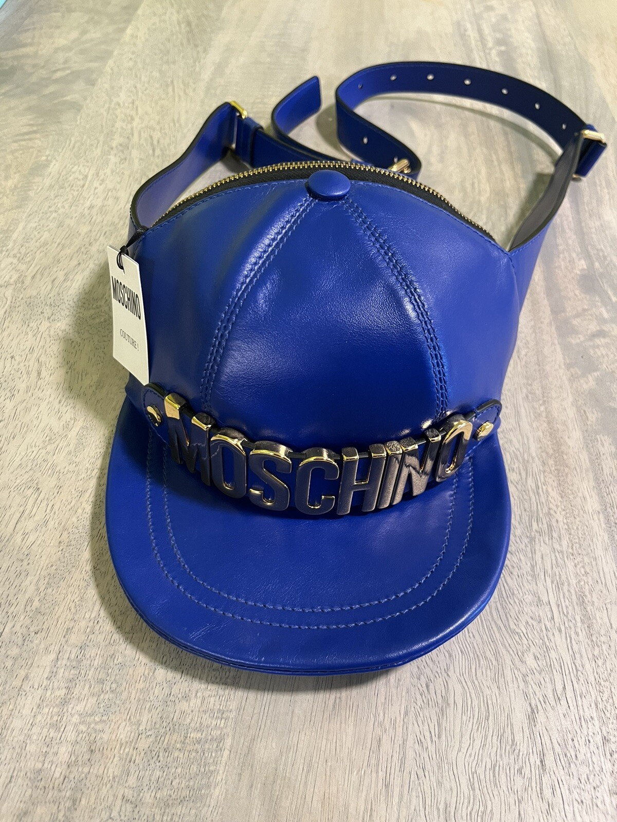 AW20 Moschino Couture Jeremy Scott LEATHER HAT SHAPED FANNY PACK BLUE GOLD LOGO.