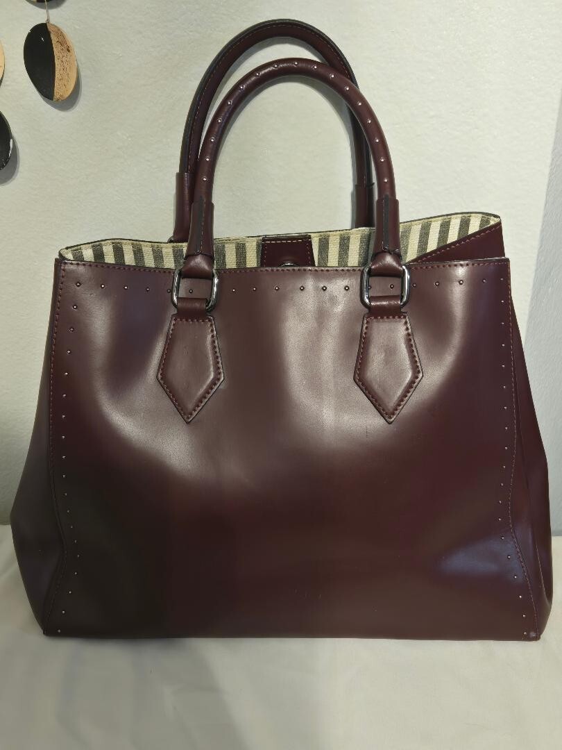 A. Bellucci Plum colored Genuine Leather Handbag Italy-Preowned Good condition
