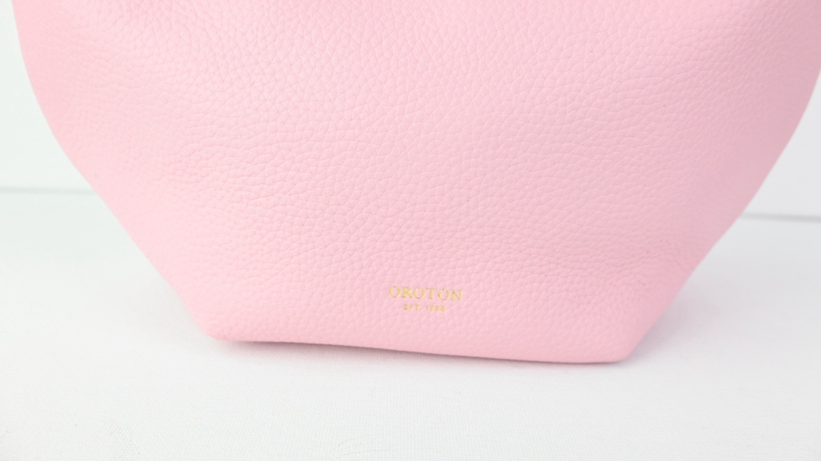 OROTON “Tulip Mini” leather day bag in tulip pink