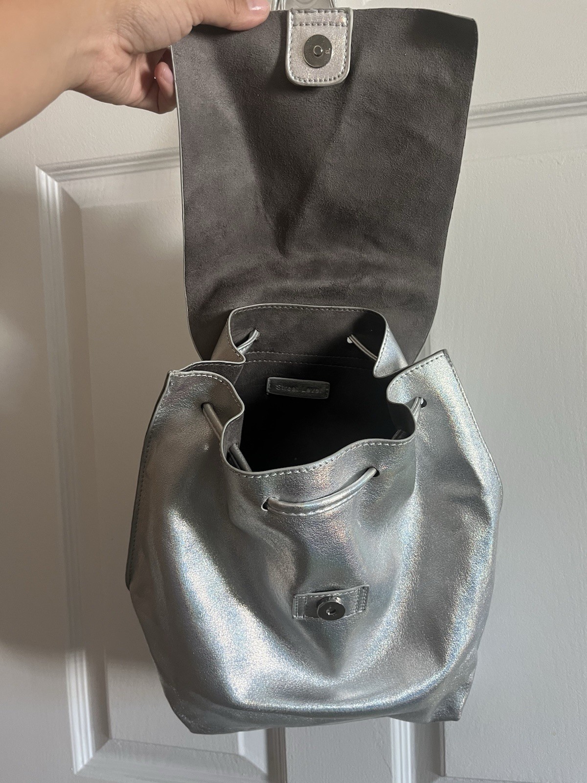 Street Level Metallic Silver Small Drawstring Backpack Magnetic Adj Strap