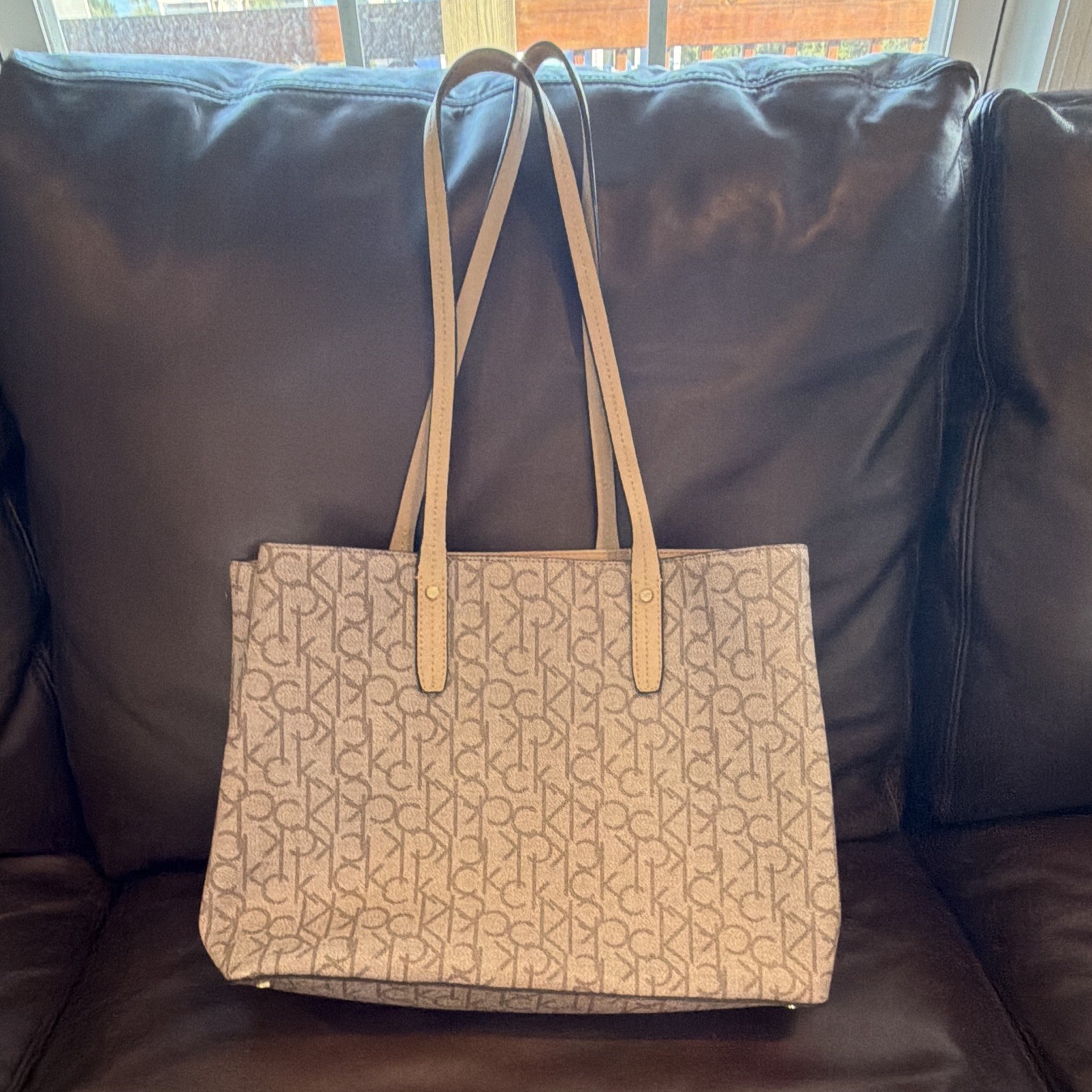 Calvin Klein CK Monogram Tote Beige Double Handles Inner Pockets Tassel Charm