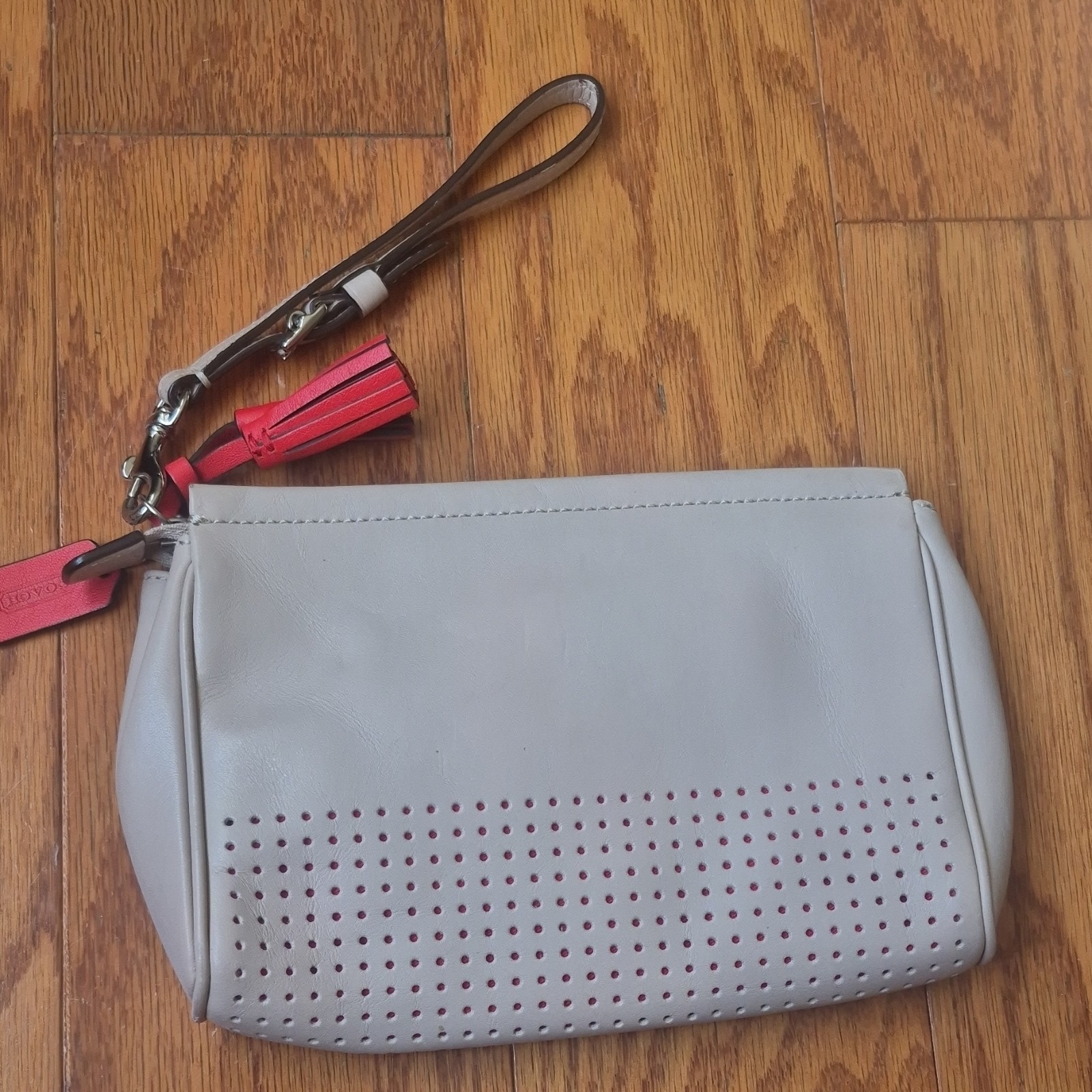 Coach Beige Red Perforated Tassel Logo Tag Silver Hardware Zip Clutch