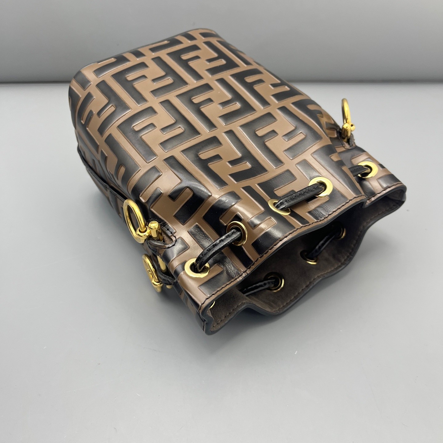 FENDI Mon Tresor Bucket Crossbody Bag FF Mini Black Brown Embossed Leather Gold