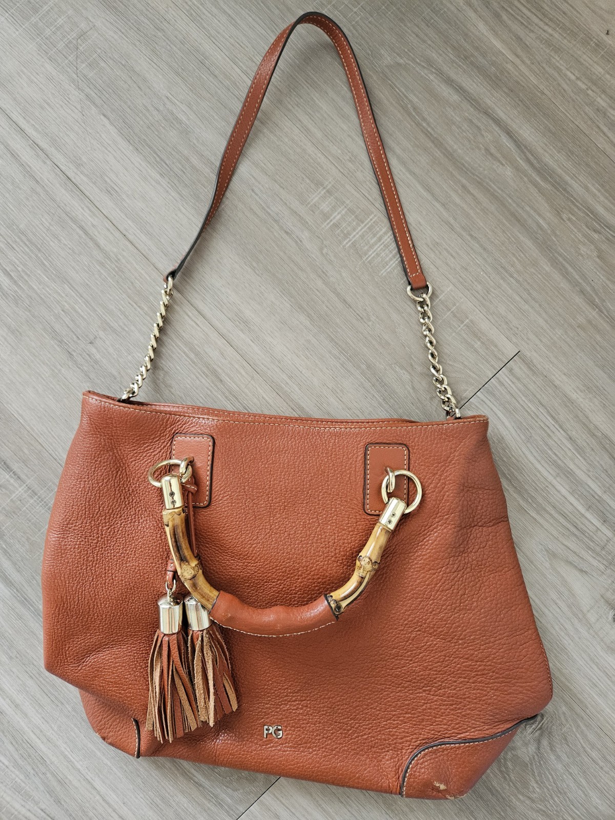 Purificación García Brown Pebbled Shoulder Bag Bamboo Handle Chain Tassel