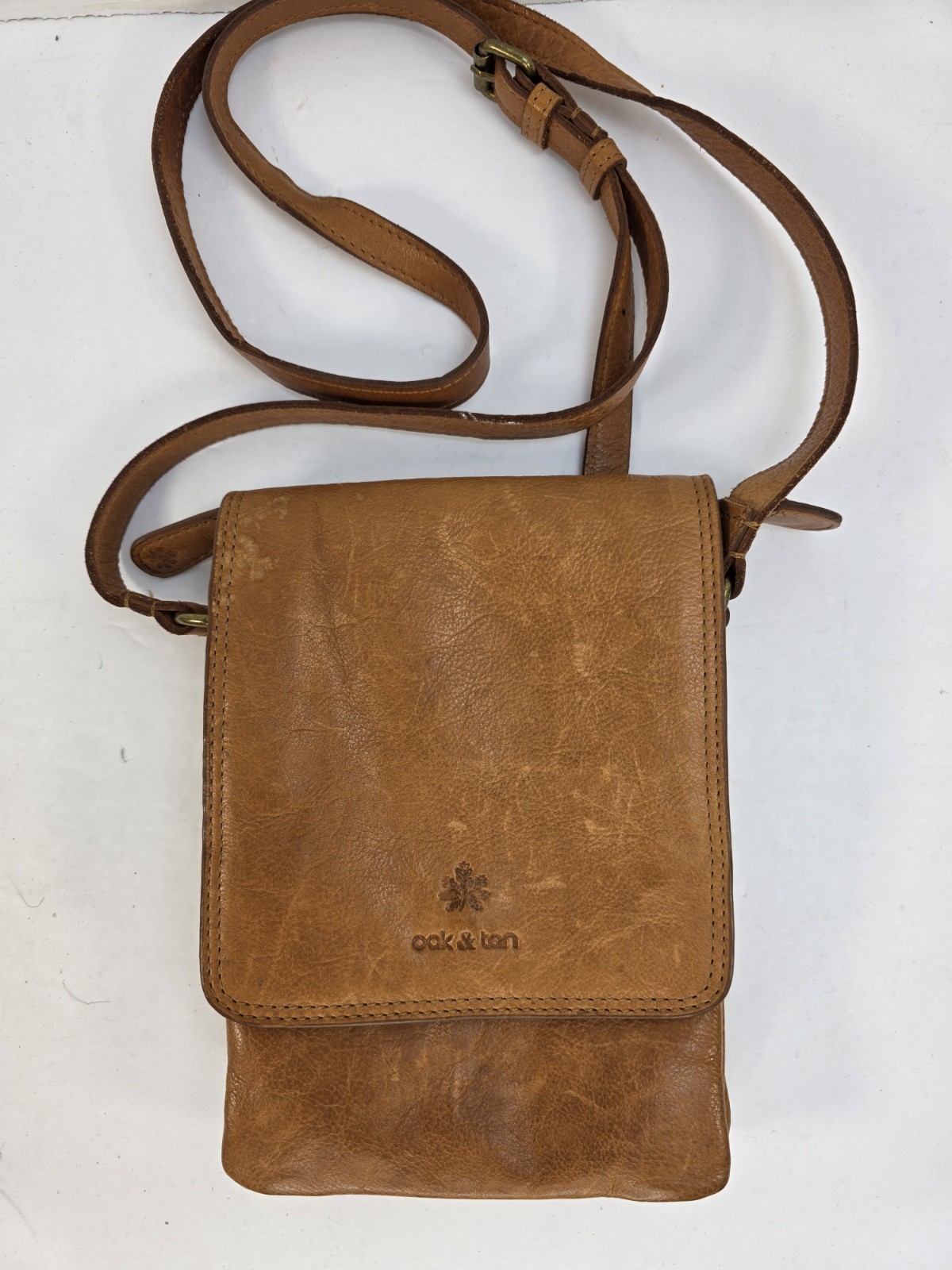 Oak & Tan leather crossbody bag in a tan/light brown color