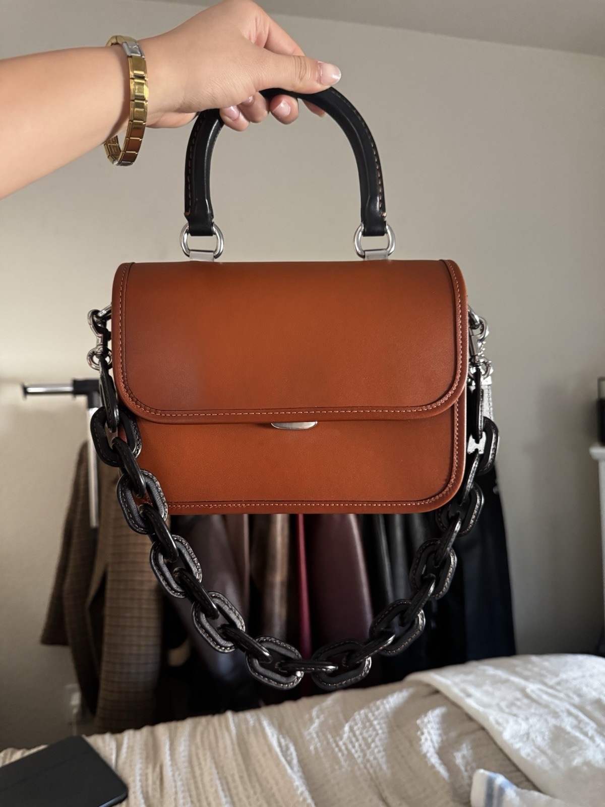 coach rogue top handle burnished amber with black color black & silver hardware