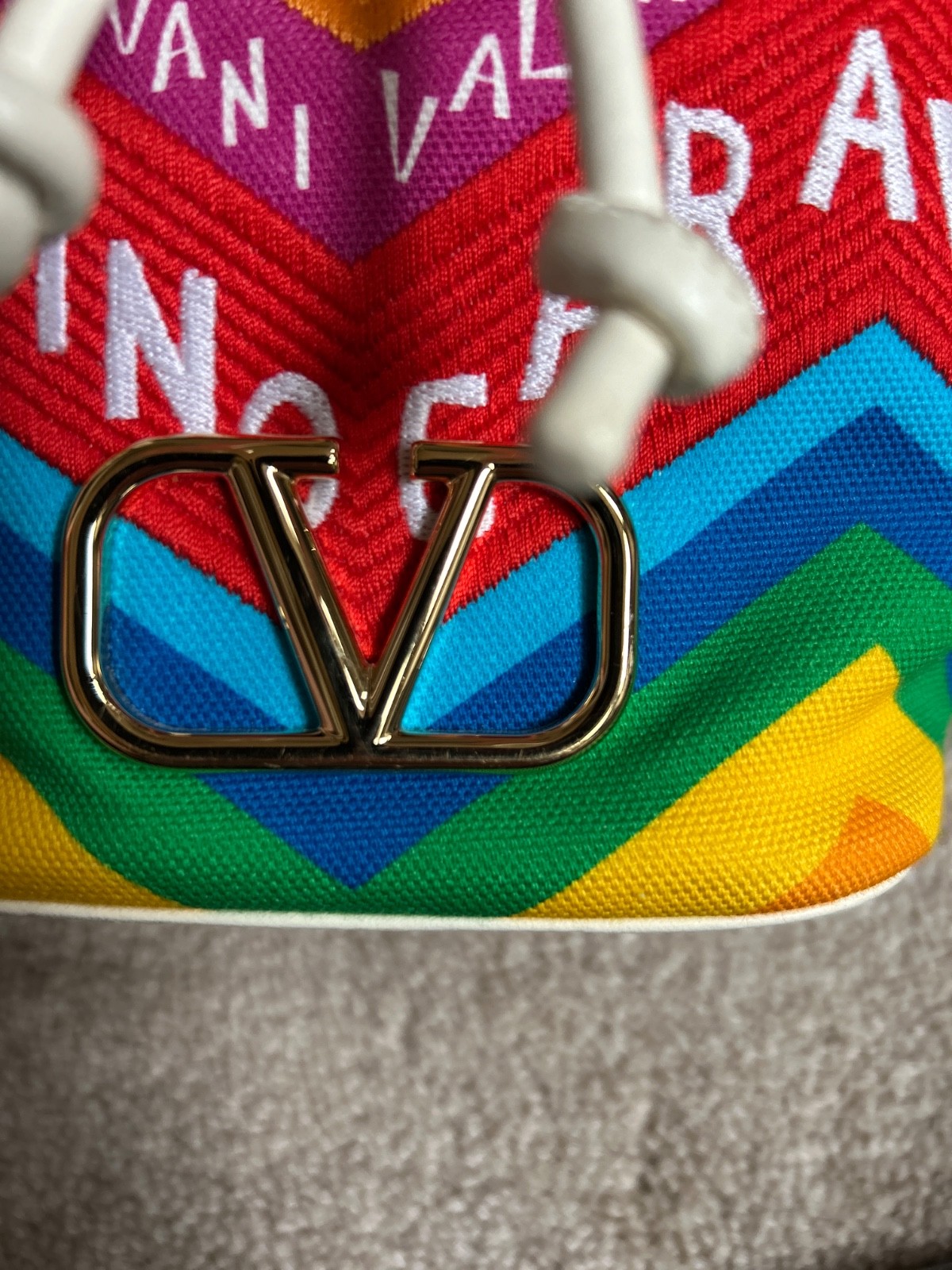 $1750 VALENTINO “Escape” VLogo Mini canvas bucket bag – Chevron24 Rainbow print