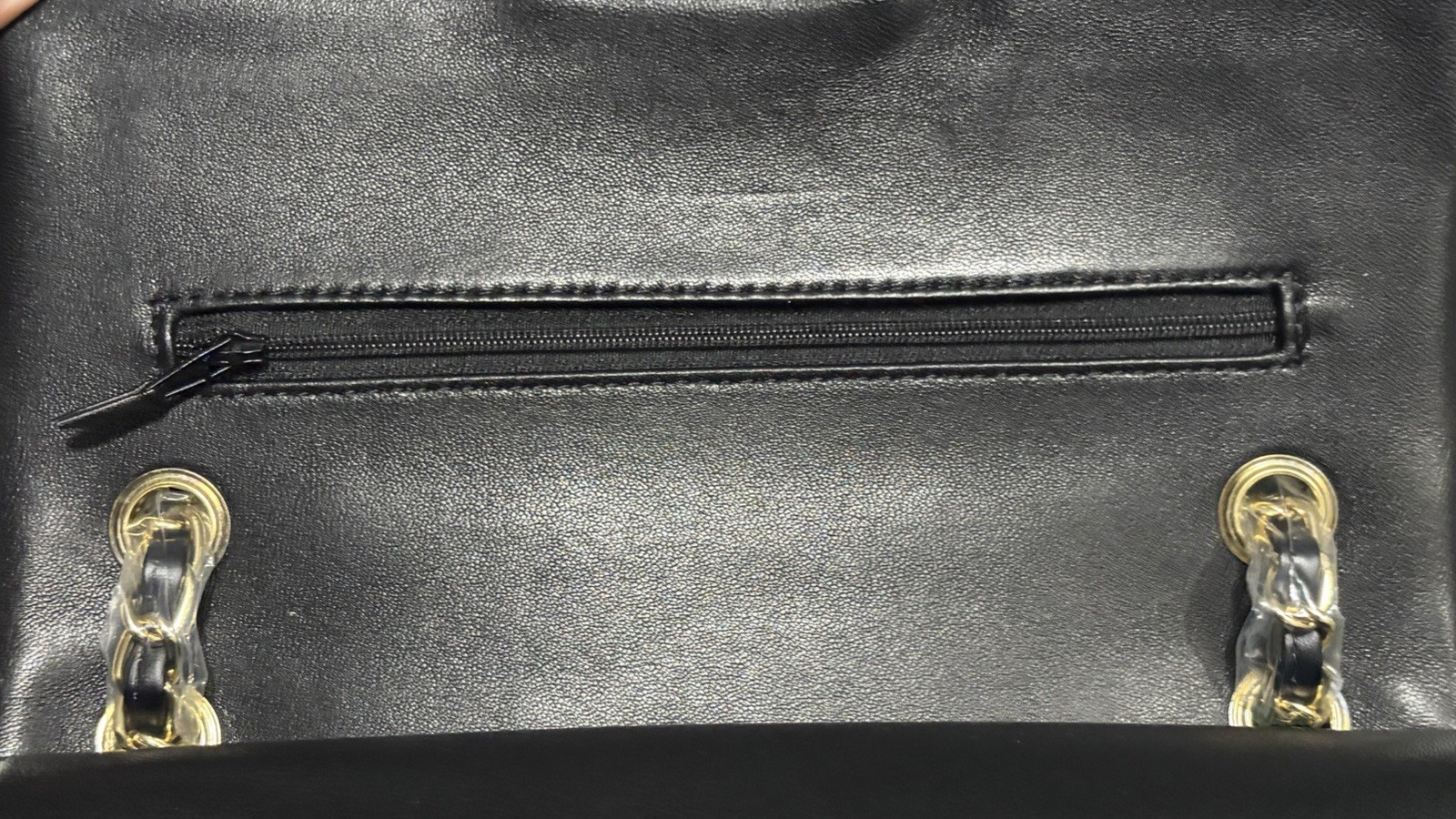 Black shoulder bag w/ original packaging and tags