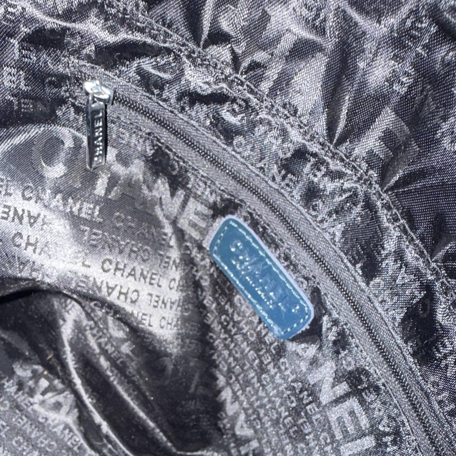 CHANEL Blue Quilted Shoulder Bag Chain Strap Logo Pattern Zip Silver Charm