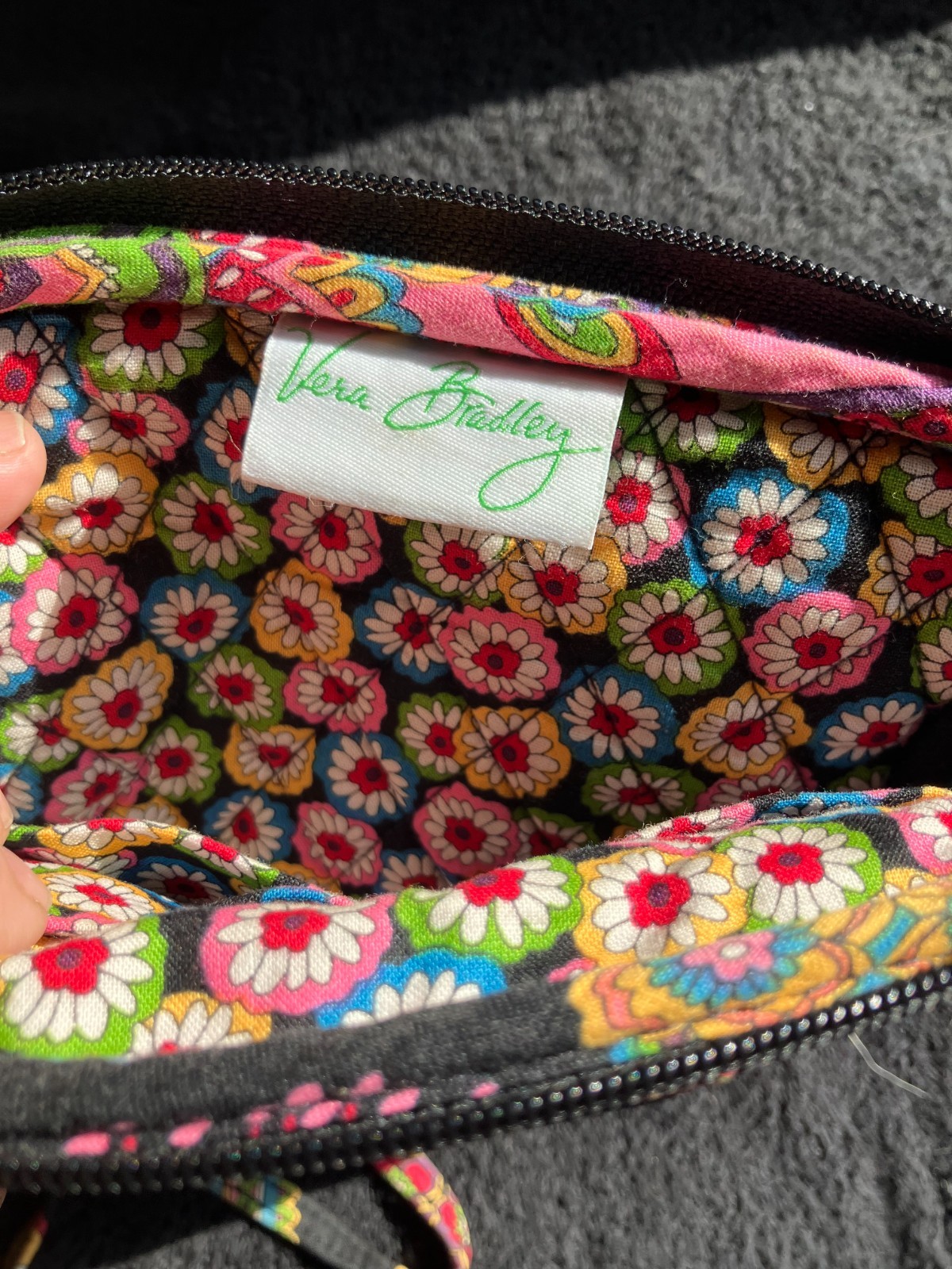 Vera Bradley small bag. Dramatic red on black, front flap, I.D, clear pocket