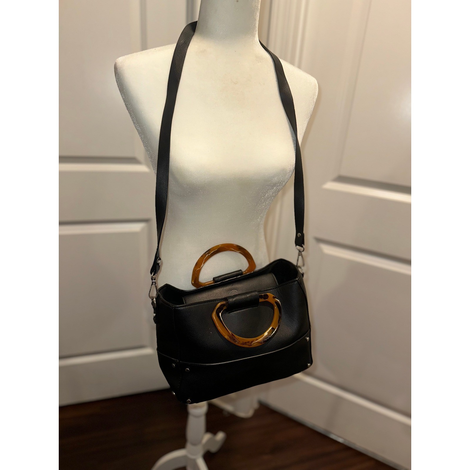 Chic Black Satchel Handbag with Tortoiseshell Handles & Studs