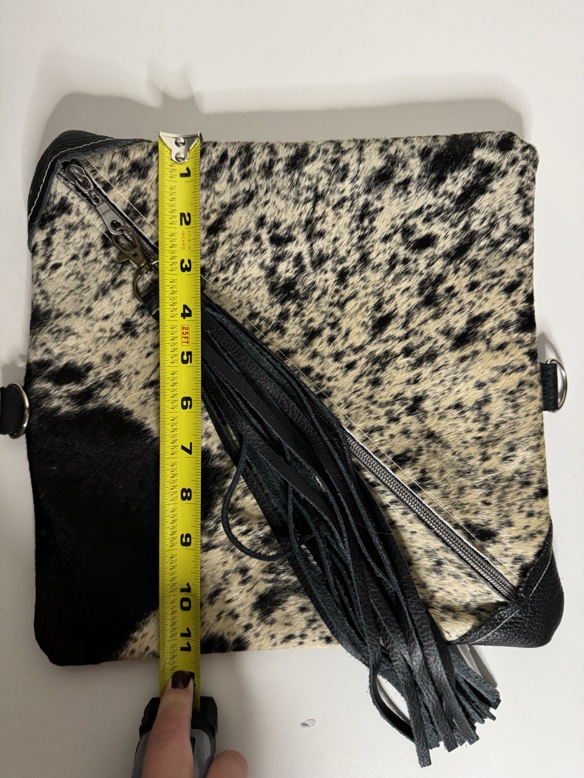 Dancing Cactus Designs Cowhide Print Leather Cosmetic Bag Tassel & Zip Closure