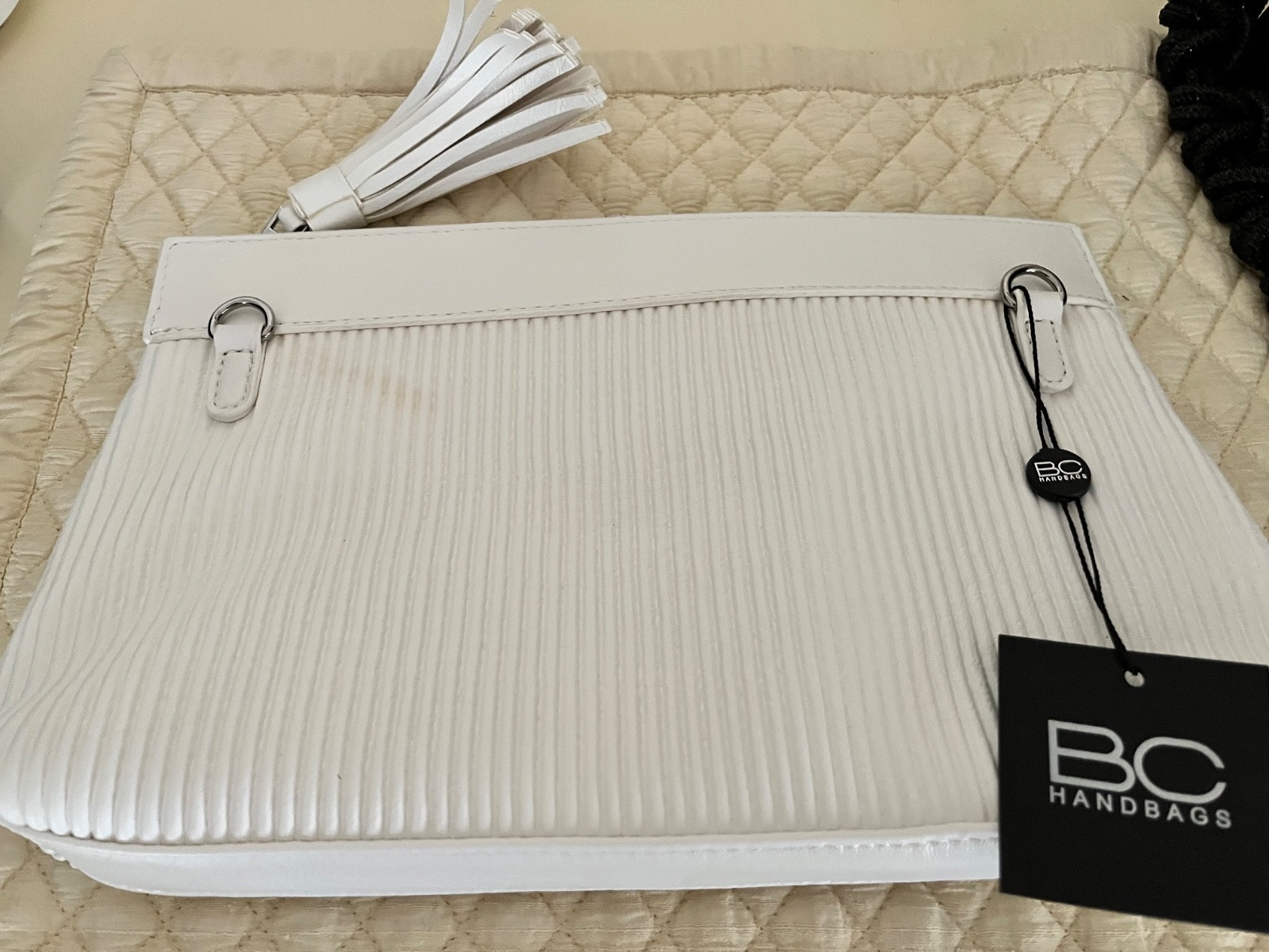 B C white shoulder/ hand carry/clutch purse China NWI tassel zip top leather?