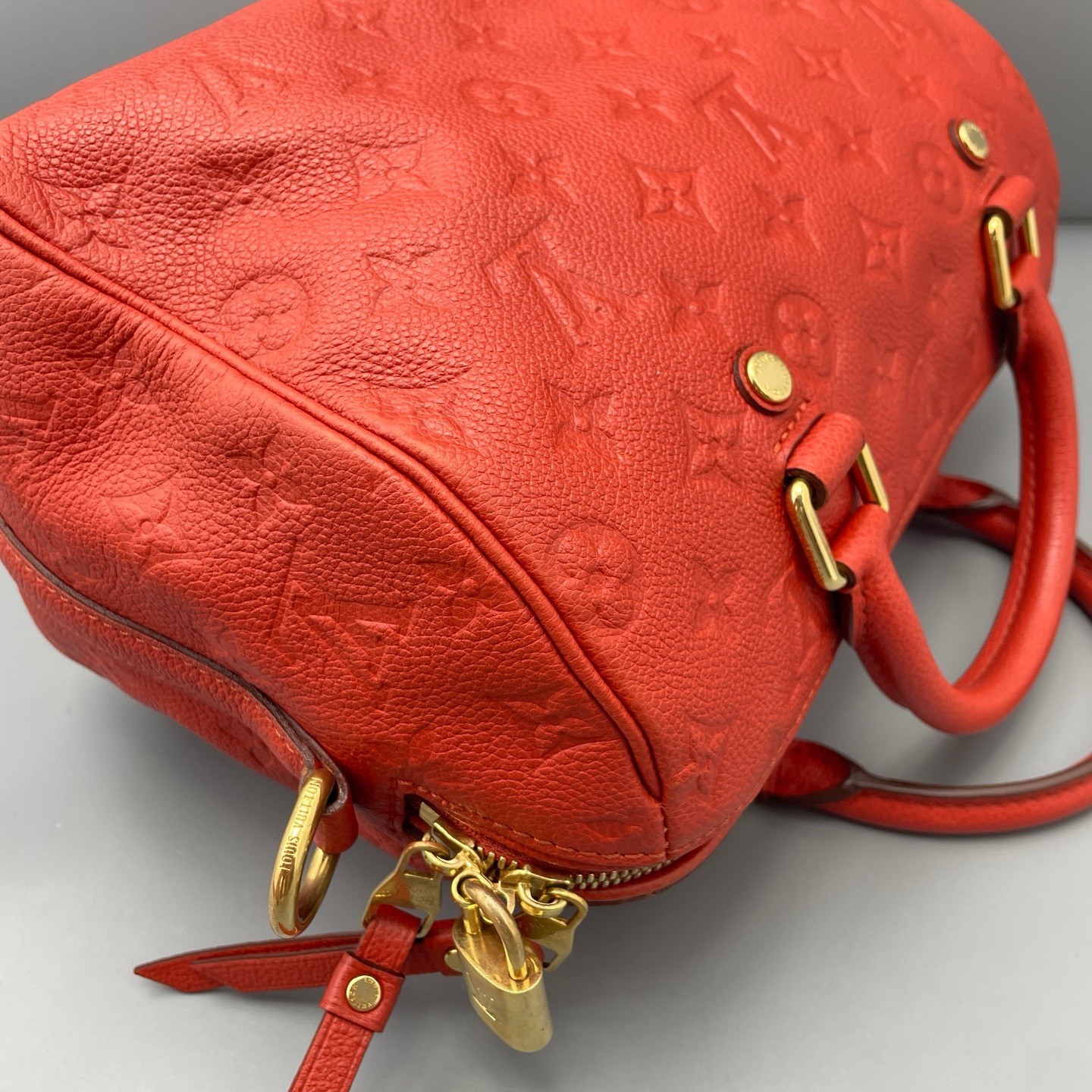 Louis Vuitton Speedy Bandoulière 25 Monogram Empreinte Red Women’s Shoulder Bag