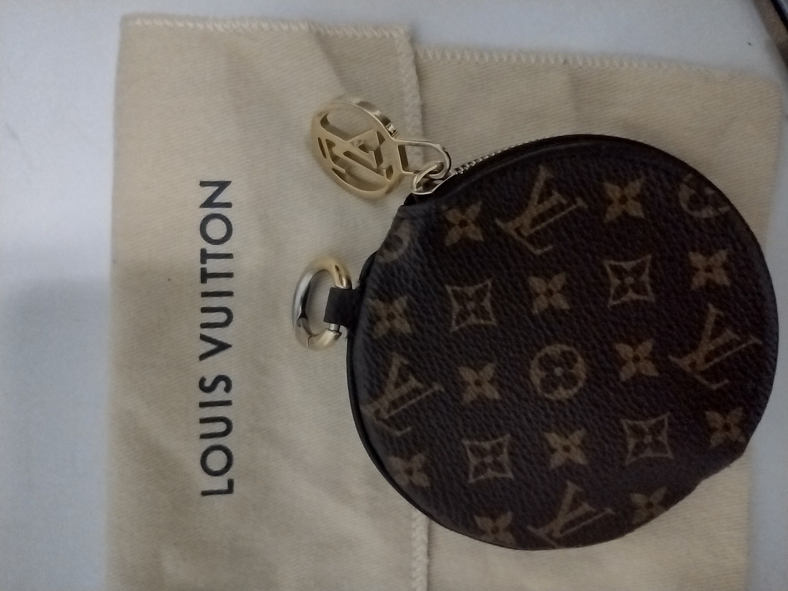 Louis Vuitton Coin Pouch from Trio Pouch Set.
