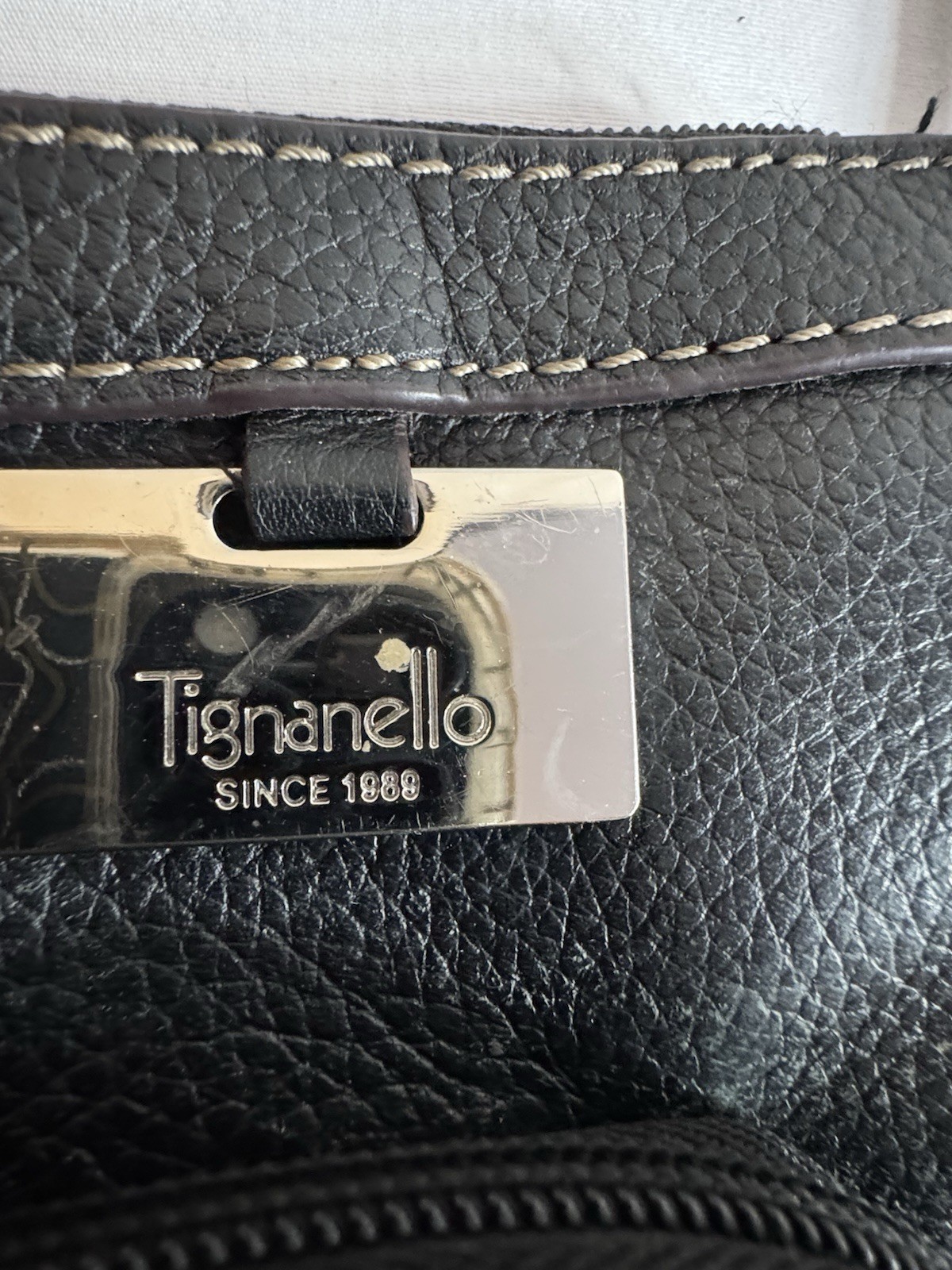 Tignanello Black Pebbled Leather Crossbody Bag White Accent Stitching & Logo