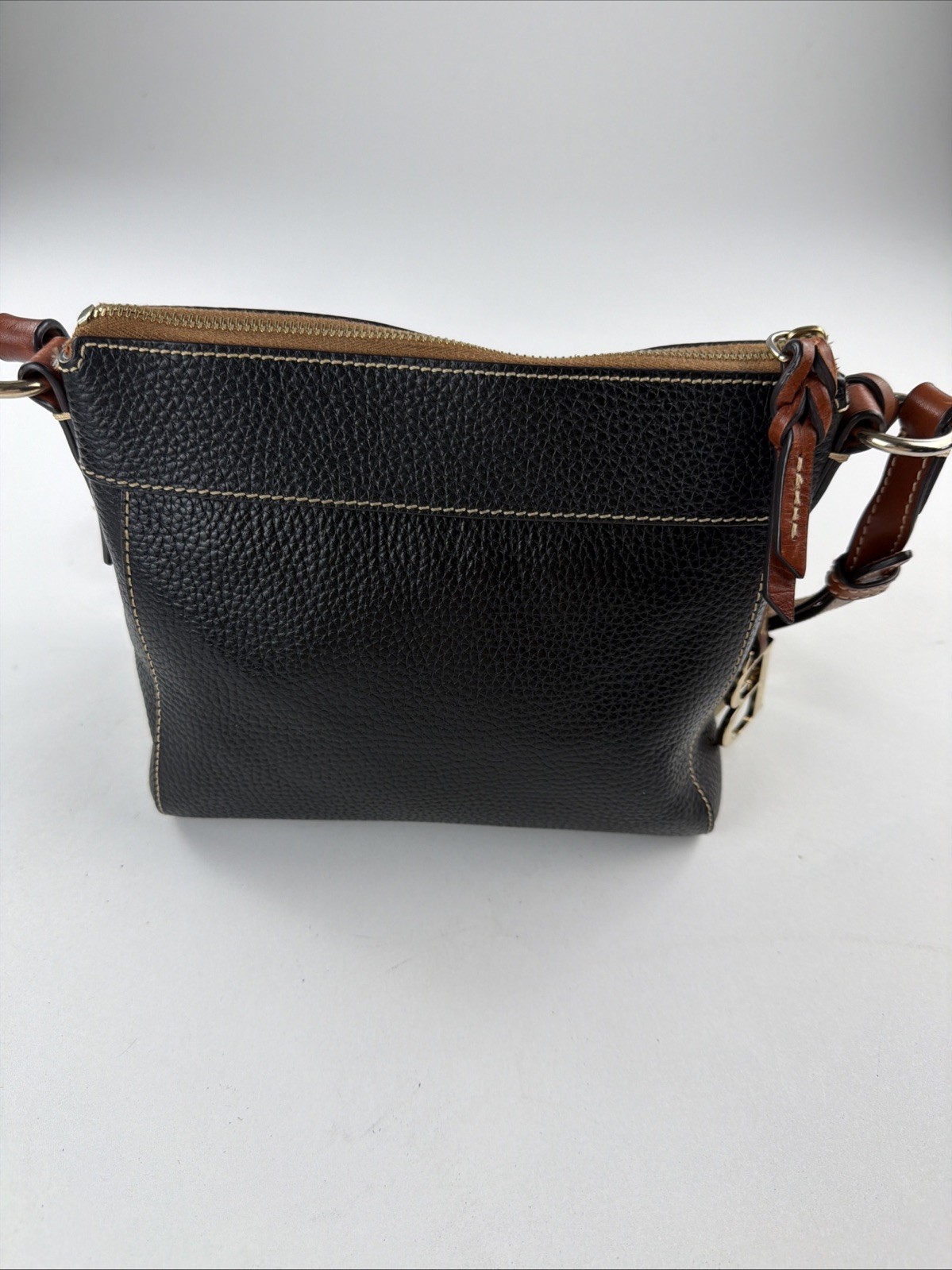 Dooney & Bourke Black Pebble Leather Crossbody Bag with Brown Trim