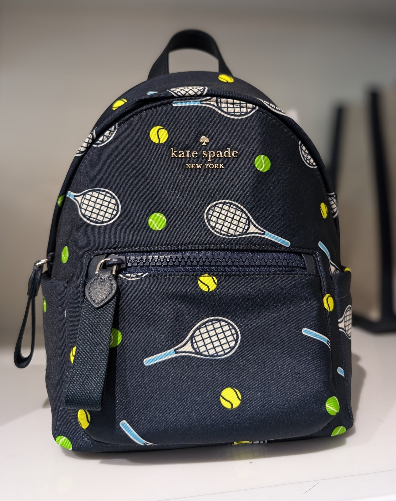 Kate Spade CHELSEA Tennis Racquet and Ball Printed Mini Backpack KF356 New KS6