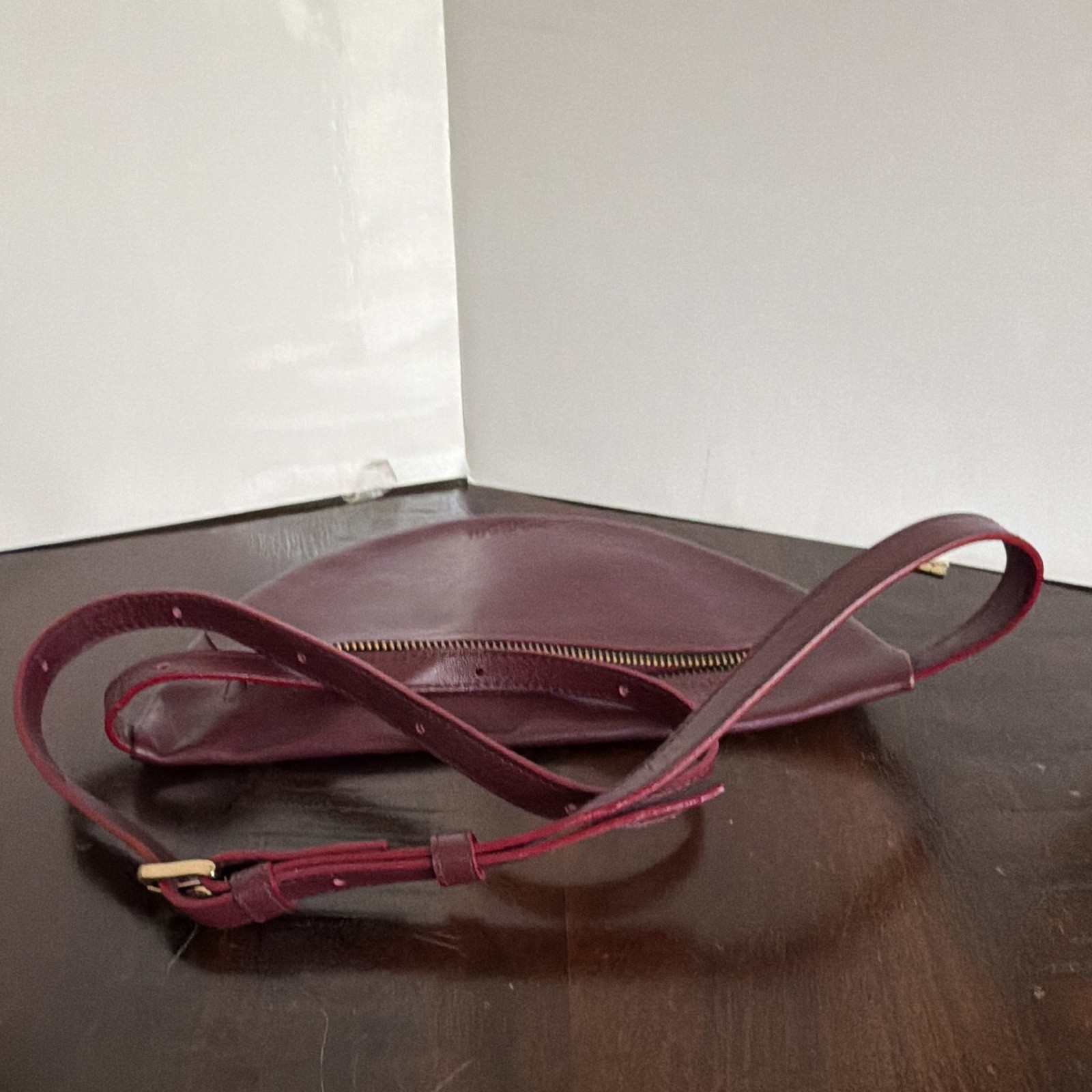 LAMARI Berlin Burgundy Crescent Crossbody Bag Gold Hardware Zip Closure
