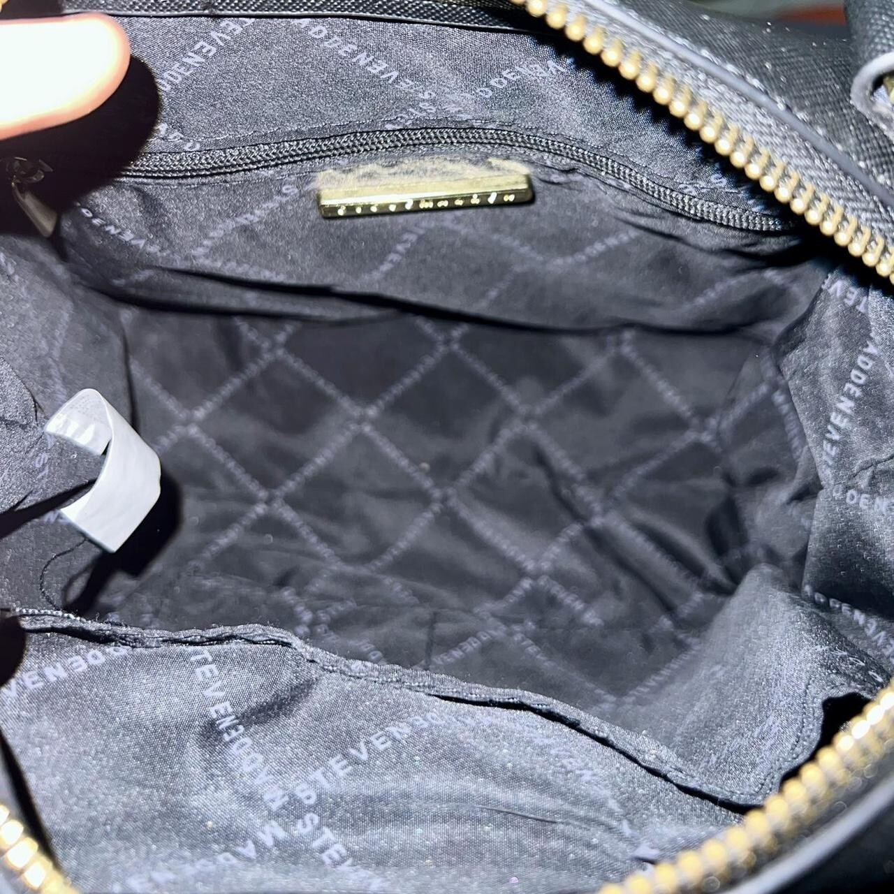 Steve Madden small black purse. 100% Polyester