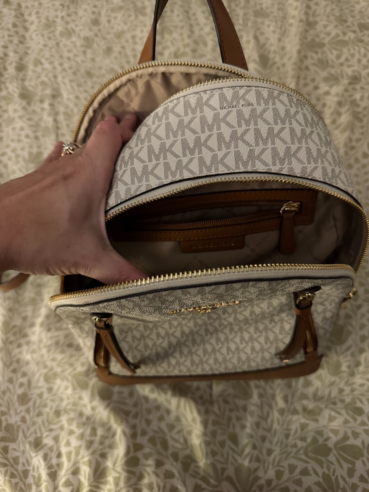 Michael Kors Backpack Great Condition. 2 Large Pockets and 2 small pockets.