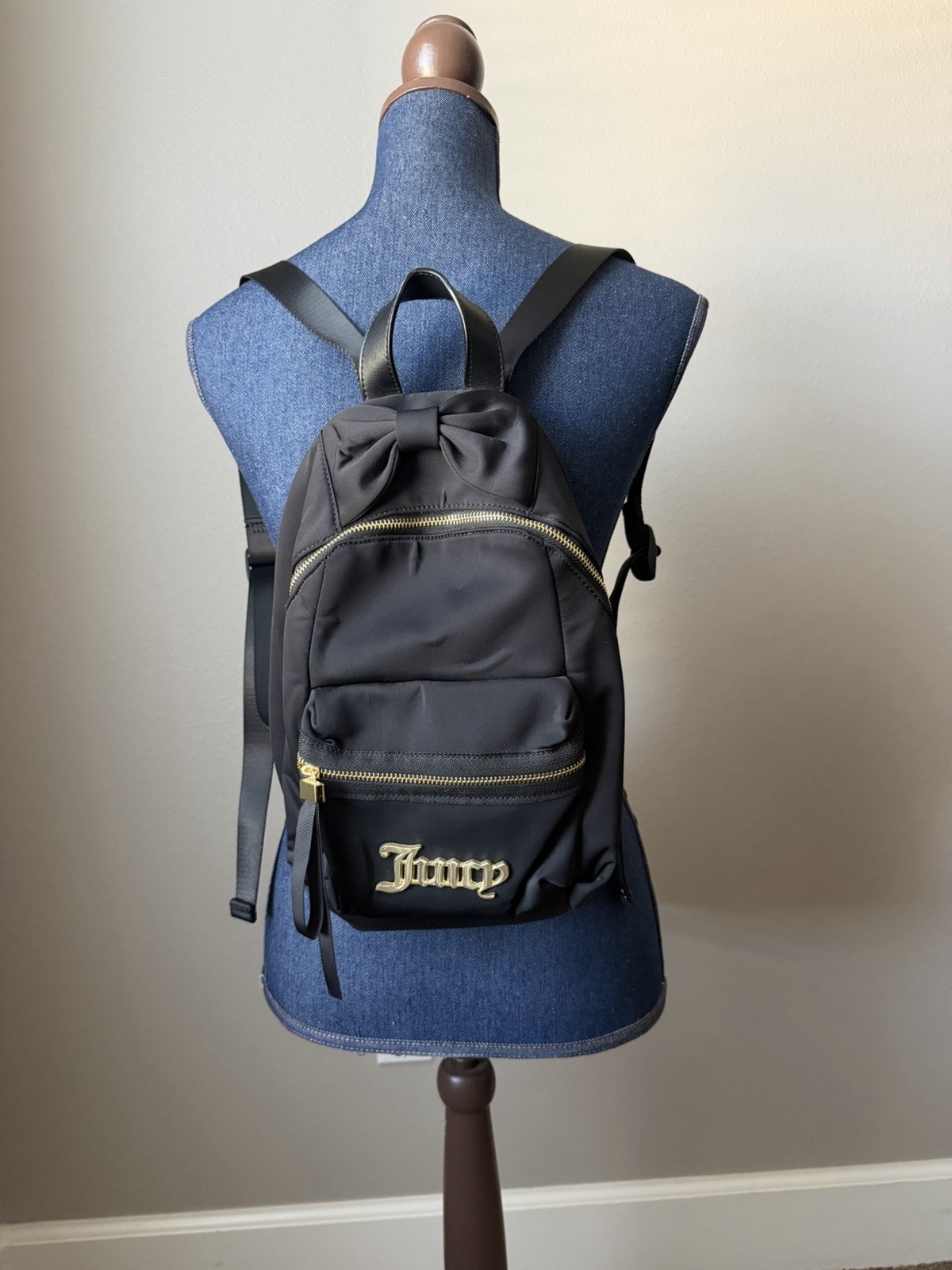 black juicy couture backpack with bow detail & gold hardware