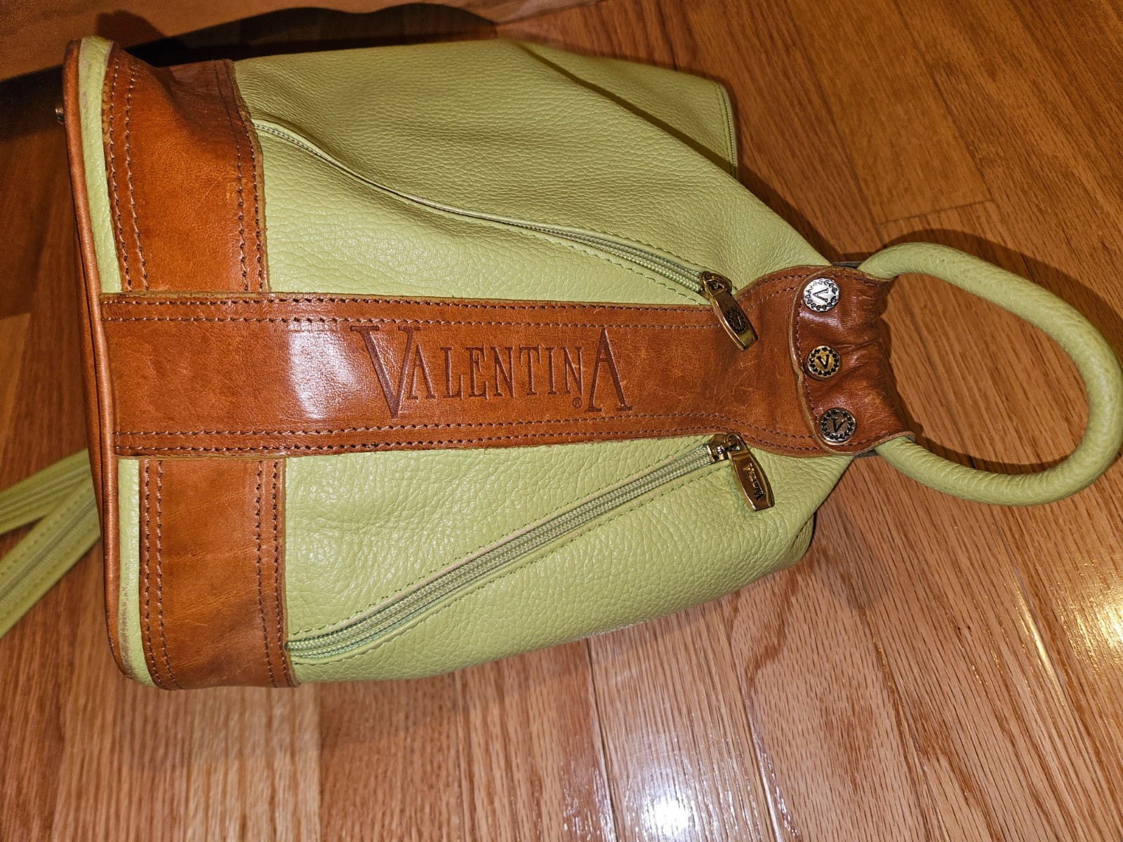 Valentina Italian leather convertible sling bag in a mint green And Brown Trim
