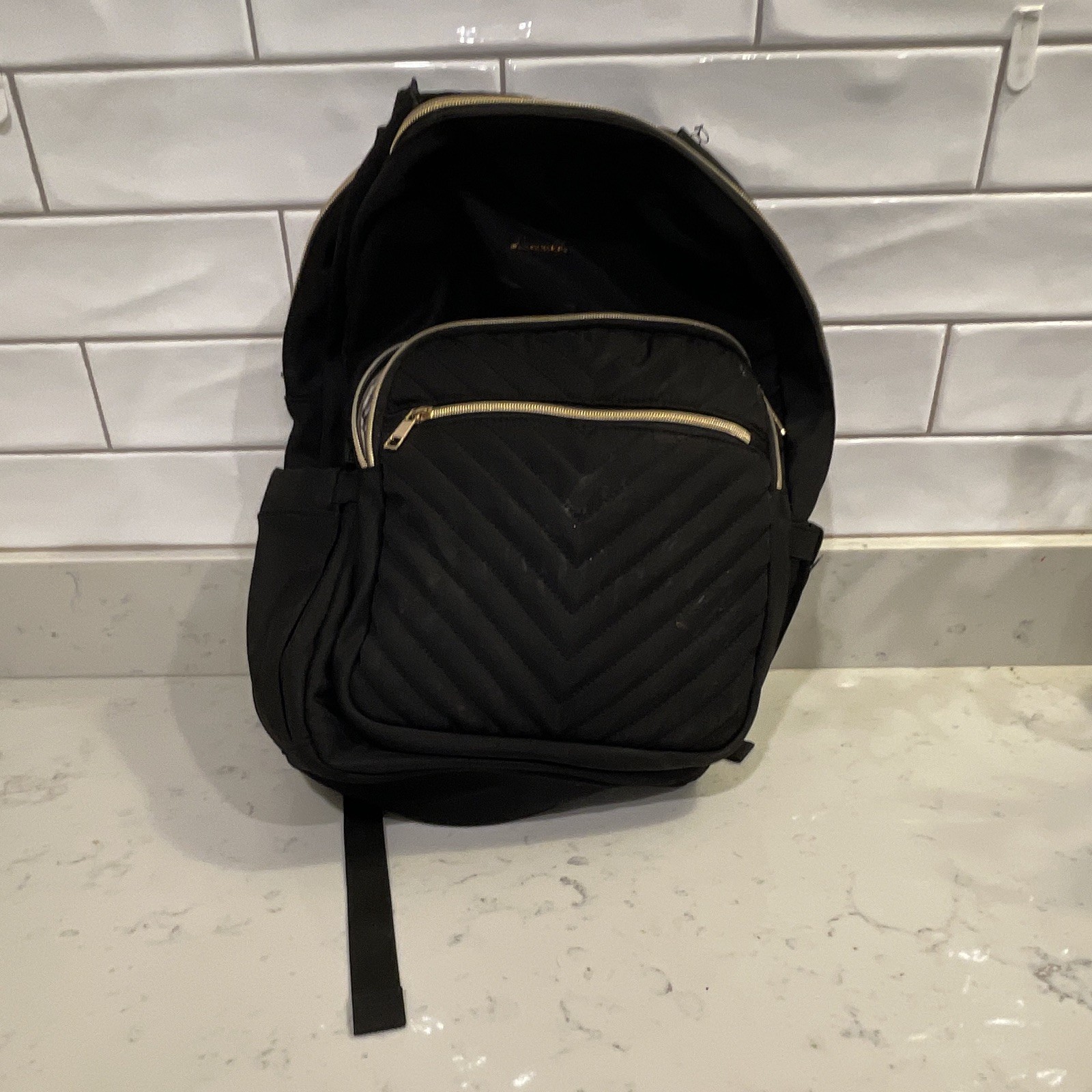 Loverack Black Quilted Backpack Gold Hardware Zip Closure Striped Lining
