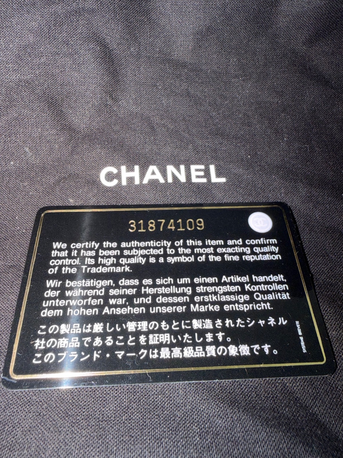 CHANEL Pink Caviar Quilted Round Vanity Case with Chain