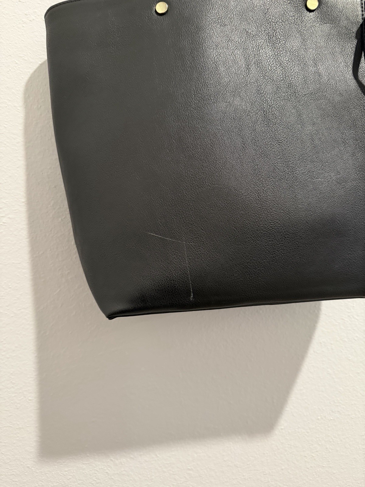 Neiman Marcus Black Women’s Tote Bag Zip Closure Side. 2 scratches as pictured