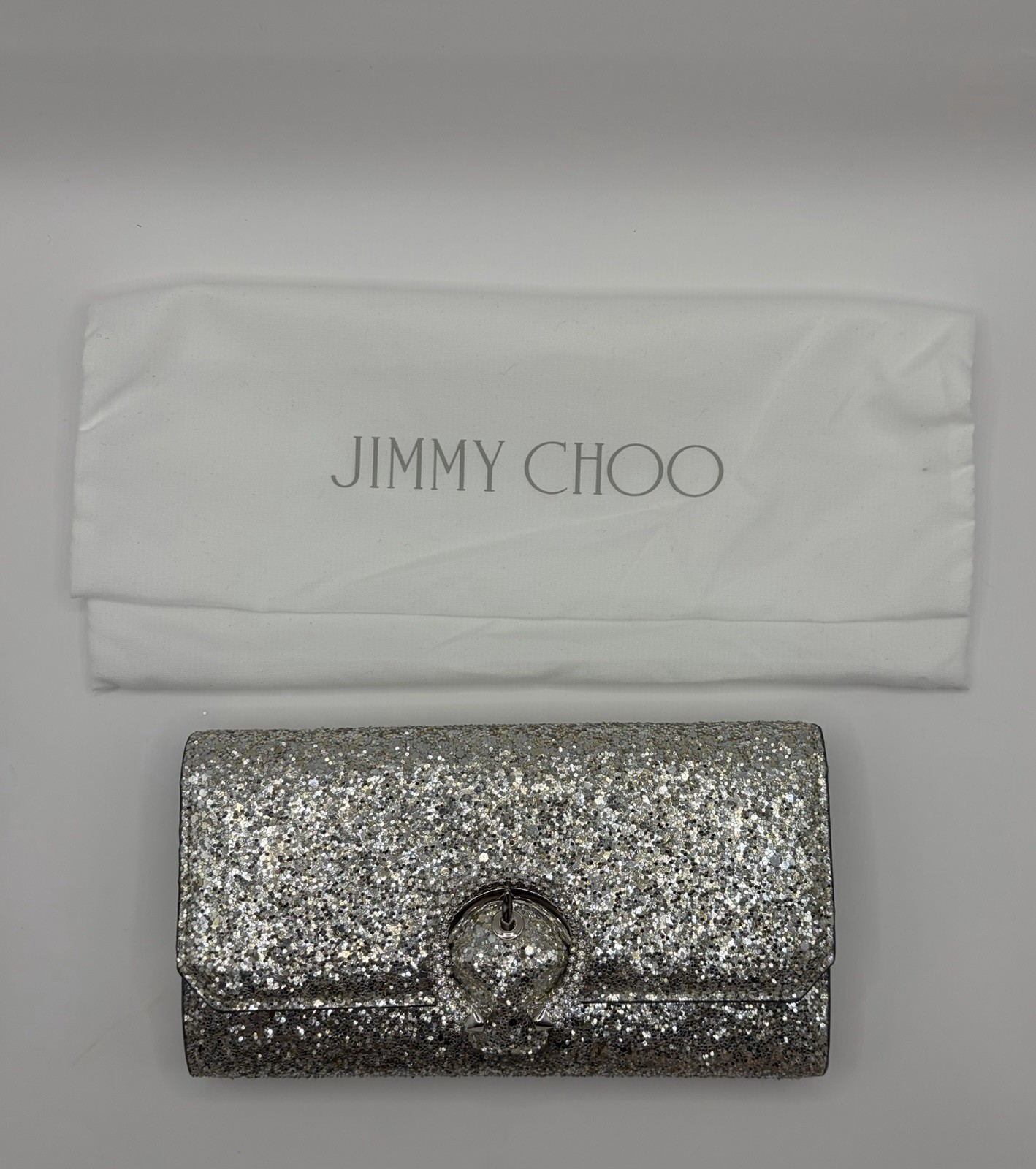 Jimmy Choo Silver Glitter Clutch w/ Chain Strap, Certificate of Authenticity.