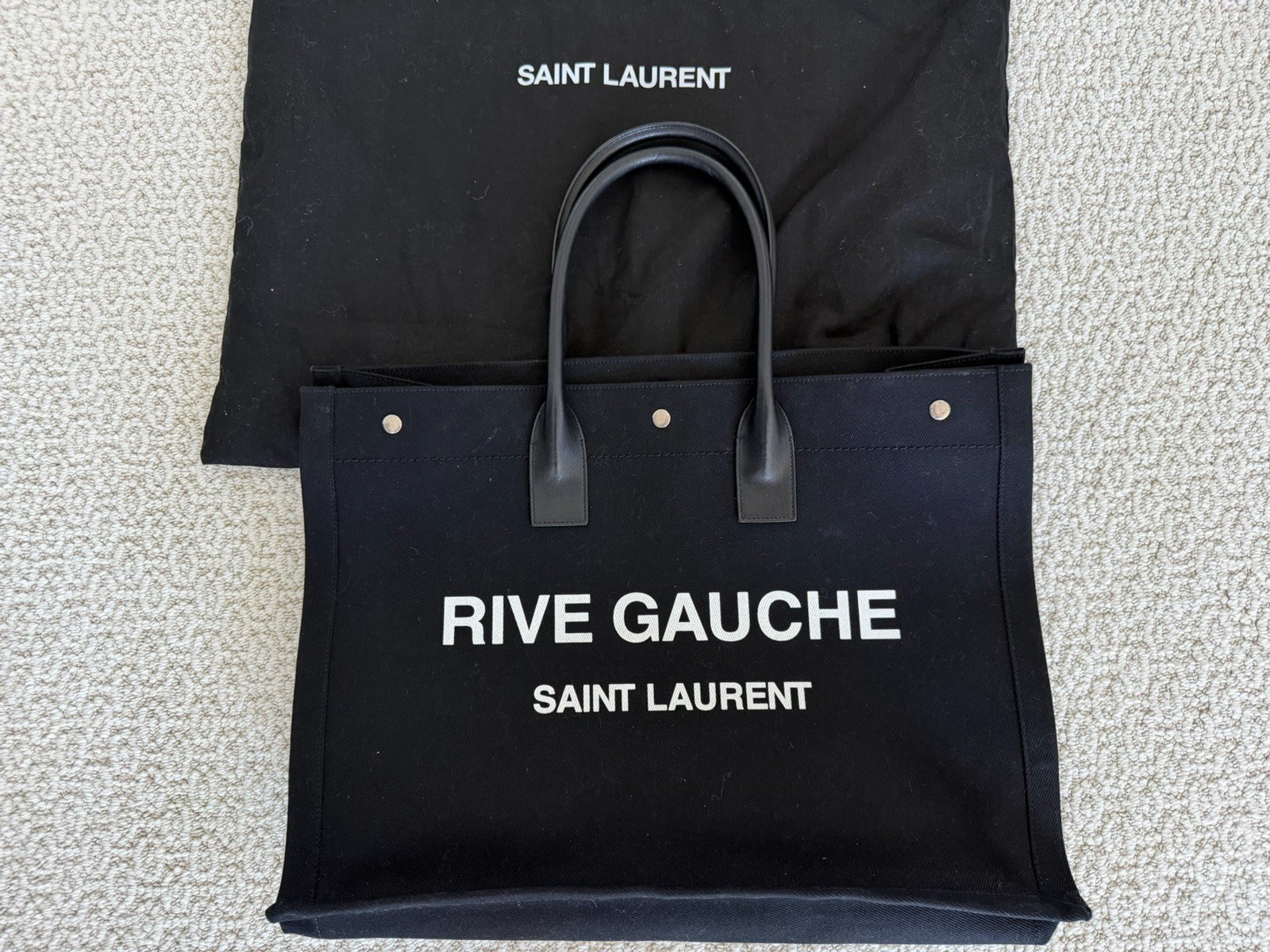 Authentic Saint Laurent “Rive Gauche” Black Canvas Top Handle Tote Bag (2021)