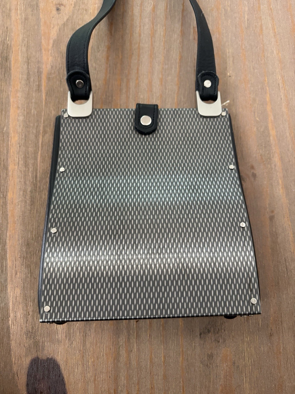 Wendy Stevens industrial stainless steel and leather drop bag mini $595
