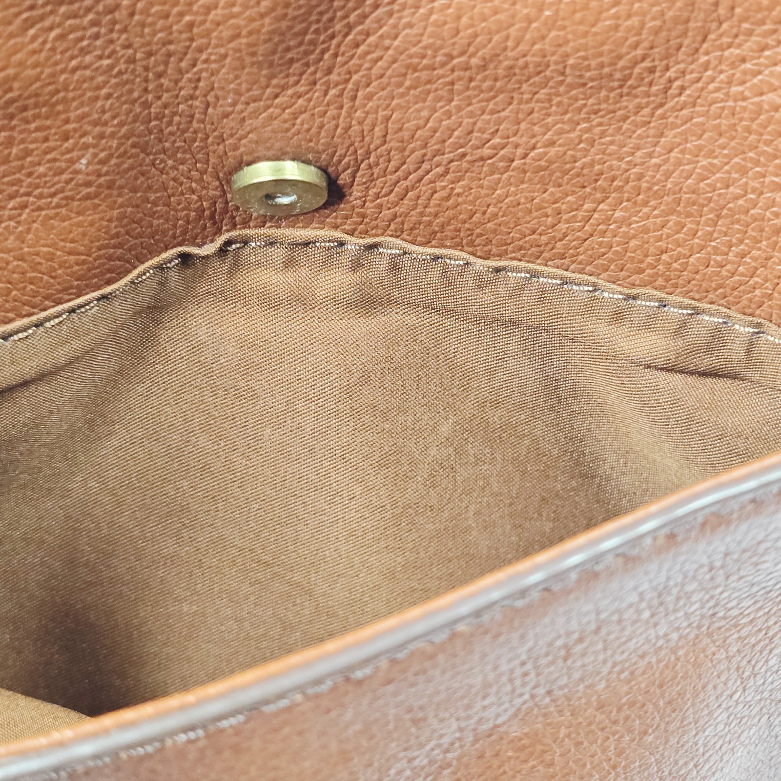 Fossil Piper Toaster Crossbody Bag in brown pebbled leather.