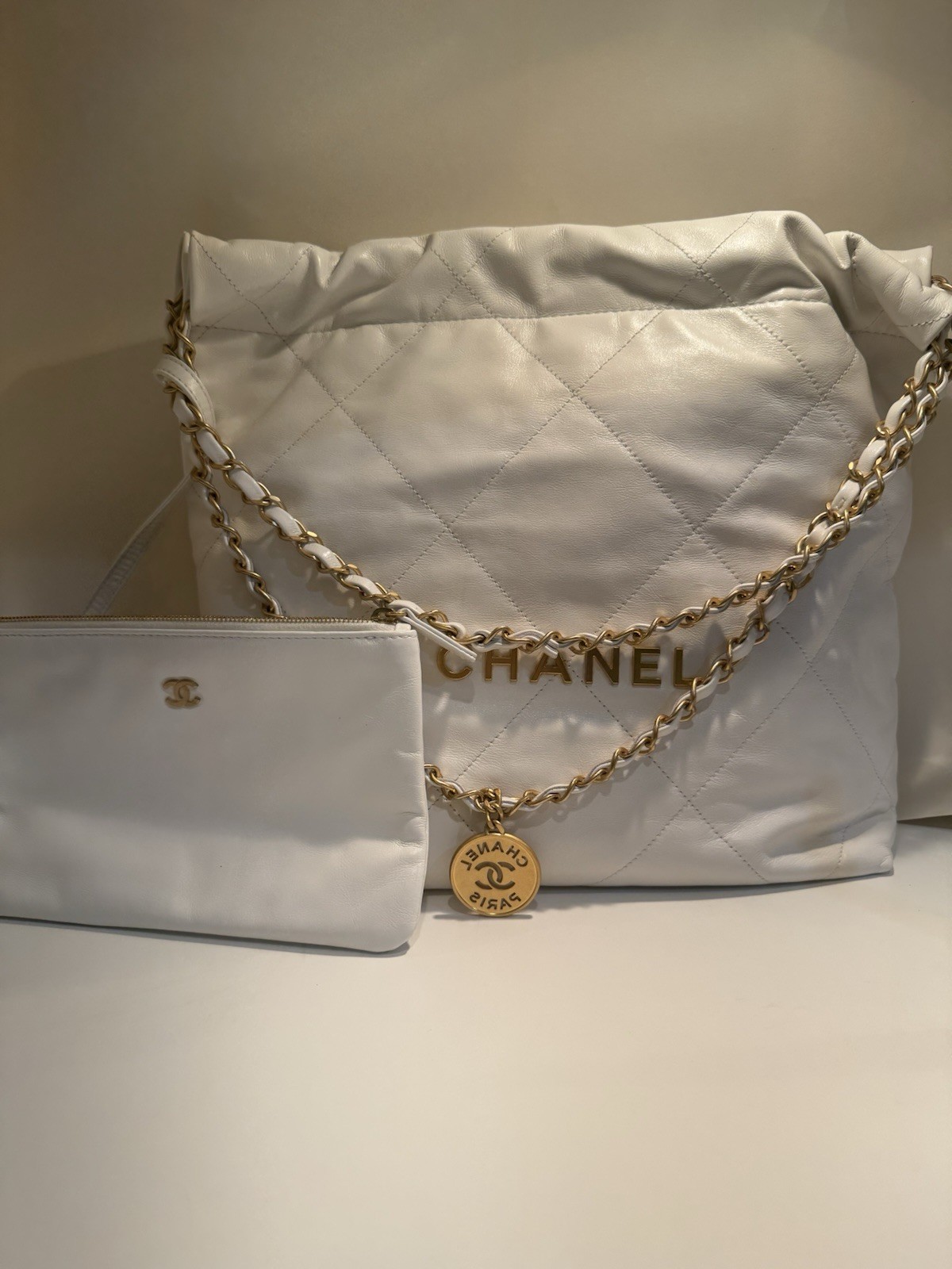 Authentic CHANEL 22 White Calfskin Leather Bag With Gold Hardware