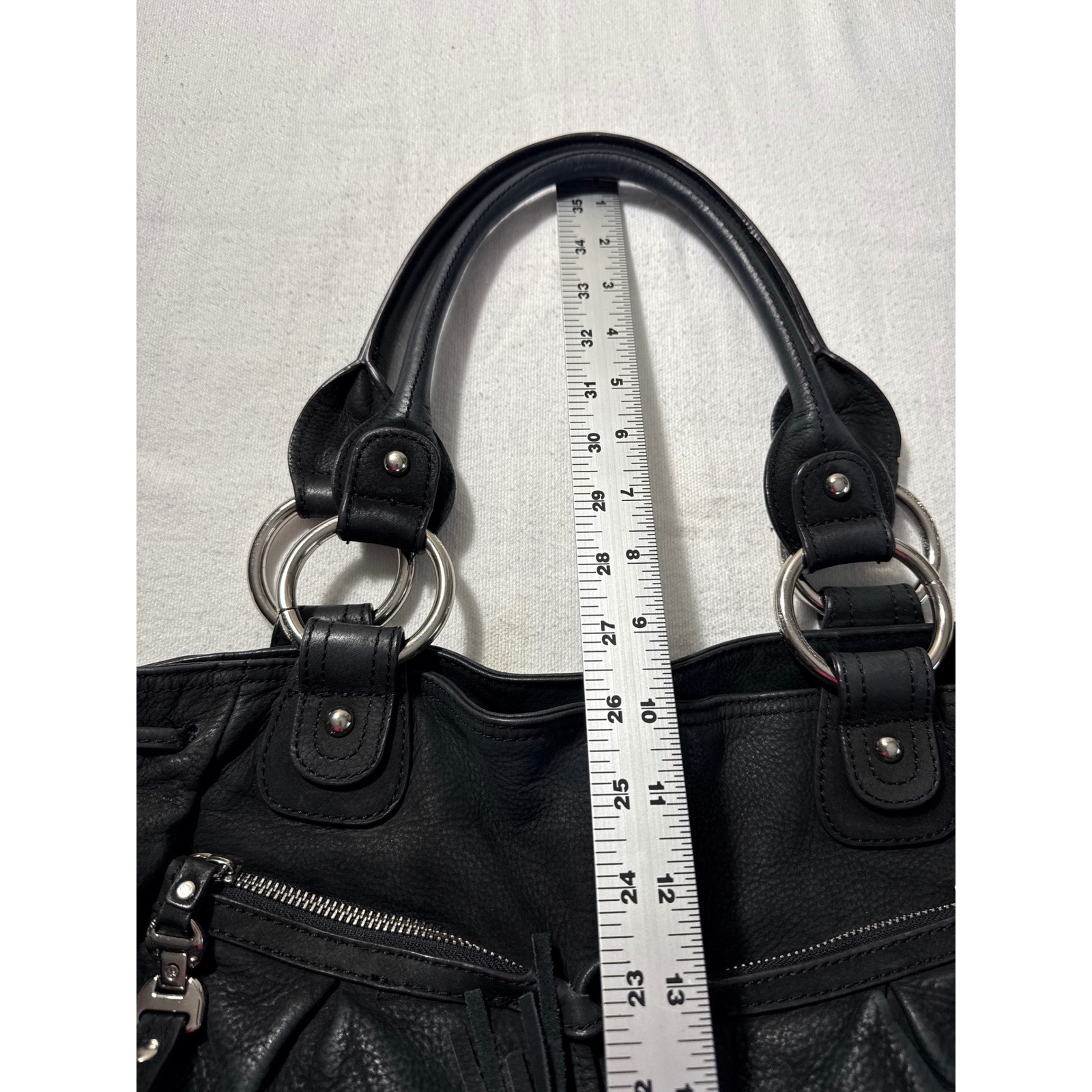 B. Makowsky Black Pebbled Leather Shoulder Bag Tassel Leopard Print Lining